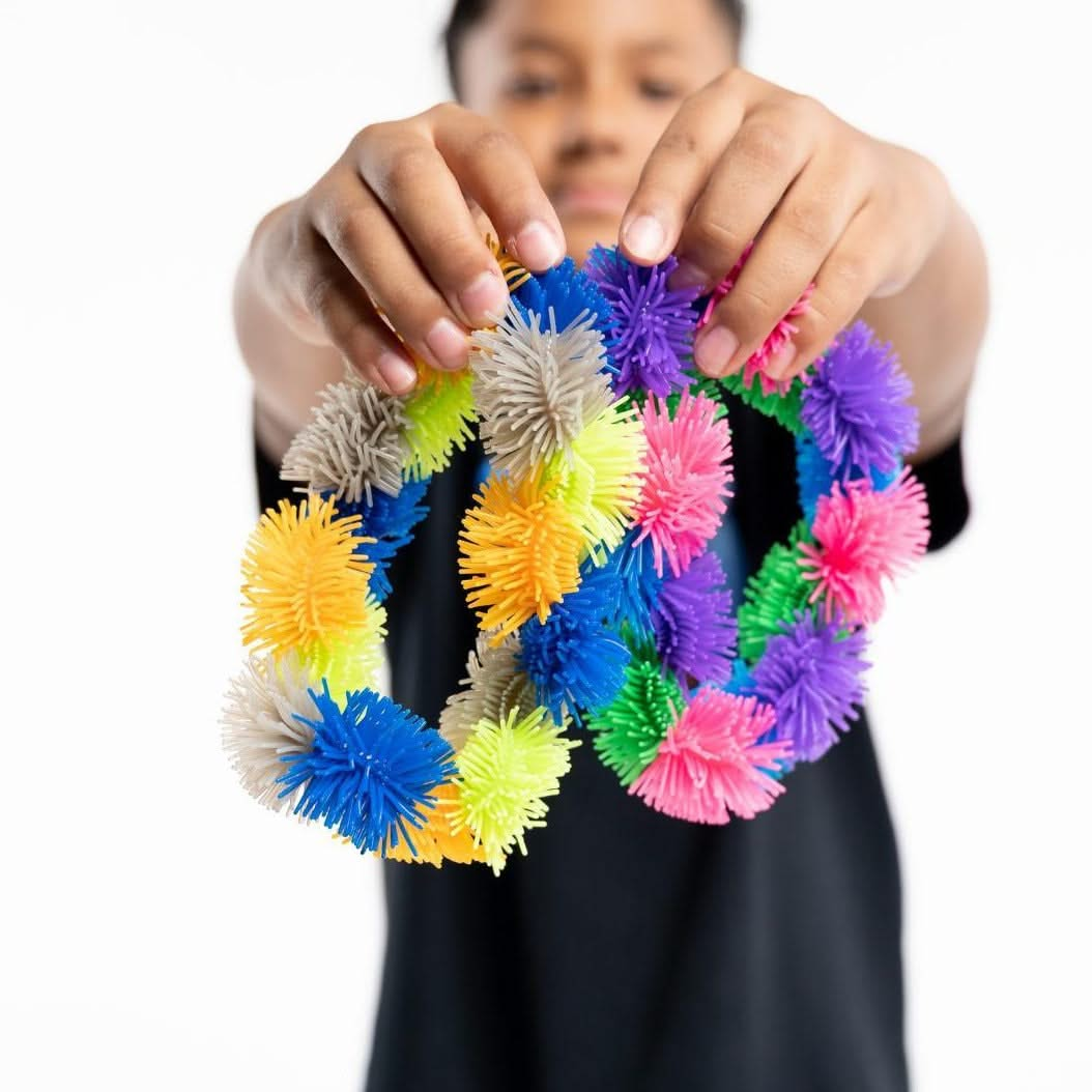 Tangle Junior Hairy, Hairy Tangle,tangle jr hairy,tangle toys,special needs tangle toys,fidget toys,focus toys,tangle fidget toys, Tangle Junior Hairy,Tangle Jr. Hairy – The Ultimate Sensory Fidget Toy The Tangle Jr. Hairy is a twisty, fuzzy, and irresistibly tactile sensory manipulative designed to captivate your senses and relieve stress. Covered with soft, stretchy spines reminiscent of a Koosh Ball, this unique fidget toy takes the classic Tangle Jr. to a whole n,TangleTangle Jr. Hairy – The Ultimate Se