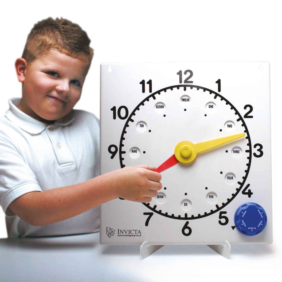 Teaching Clock, Teaching Clock English,Invicta teaching clock,Morleys teaching resources,handson learning resources, Teaching Clock,By turning the dial on the Teaching Clock, 6 alternative faces appear: 24 hour, roman numerals, minutes, words, fractions - and there is even a blank space to write on! The internally-sprung hands on the Teaching Clock move independently so that time before and after the hour can be shown without the hour hand moving. ,Teaching ClockBy turning the dial on the Teaching Clock, 6 