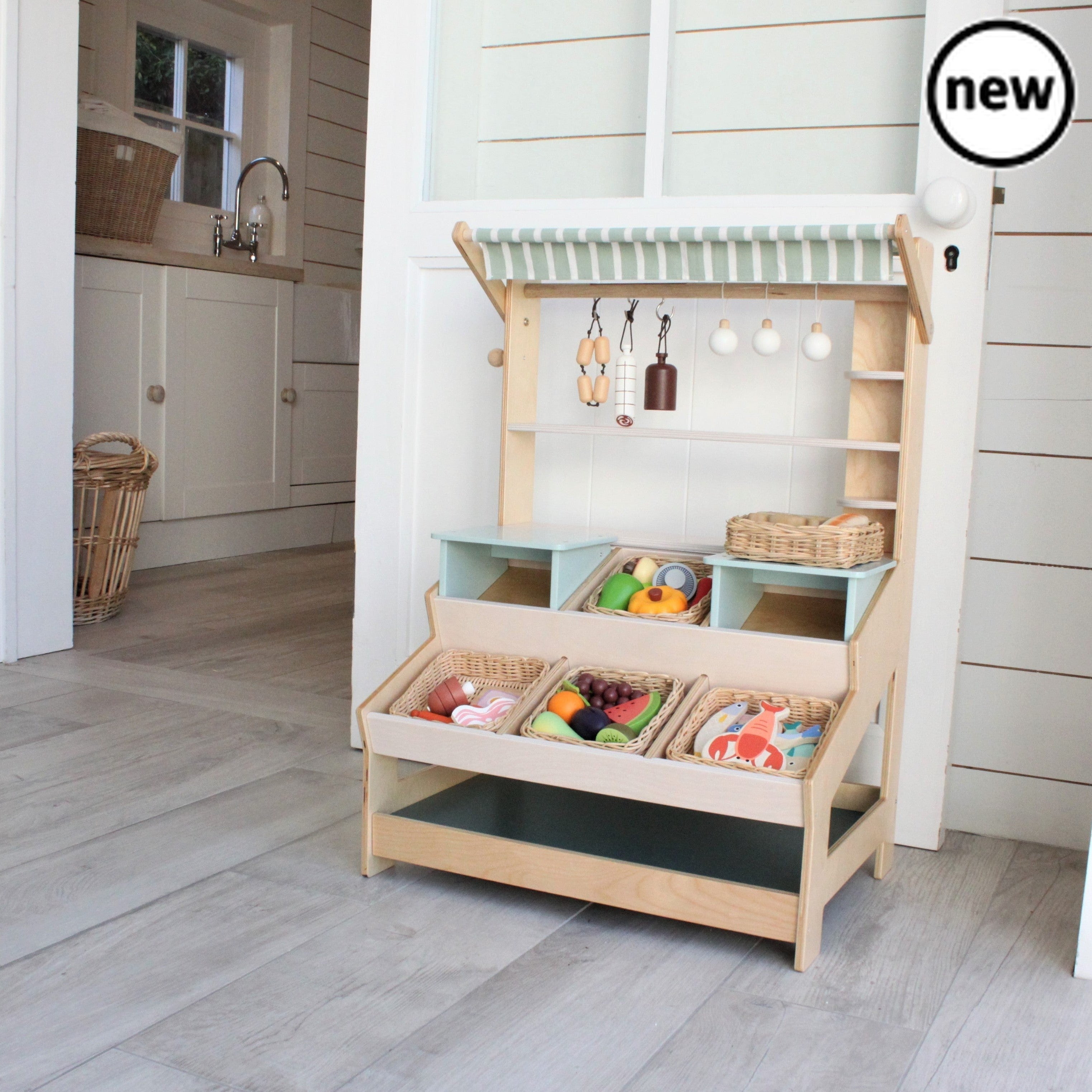 Tenderleaf Toys Wooden Market Stall with Shelves, Tenderleaf Toys Wooden Market Stall with Shelves,Wooden, Tenderleaf Toys Wooden Market Stall with Shelves,Tender Leaf General Stores is a market stall with shelves and two inter-changeable mini platforms so that it can be adapted to any kind of store. A lovely striped canopy can be lowered to protect your fresh produce from the sun, and at night there are three cute light bulbs you can use plus metal hooks to hang yourTender Leaf General Stores is a market s