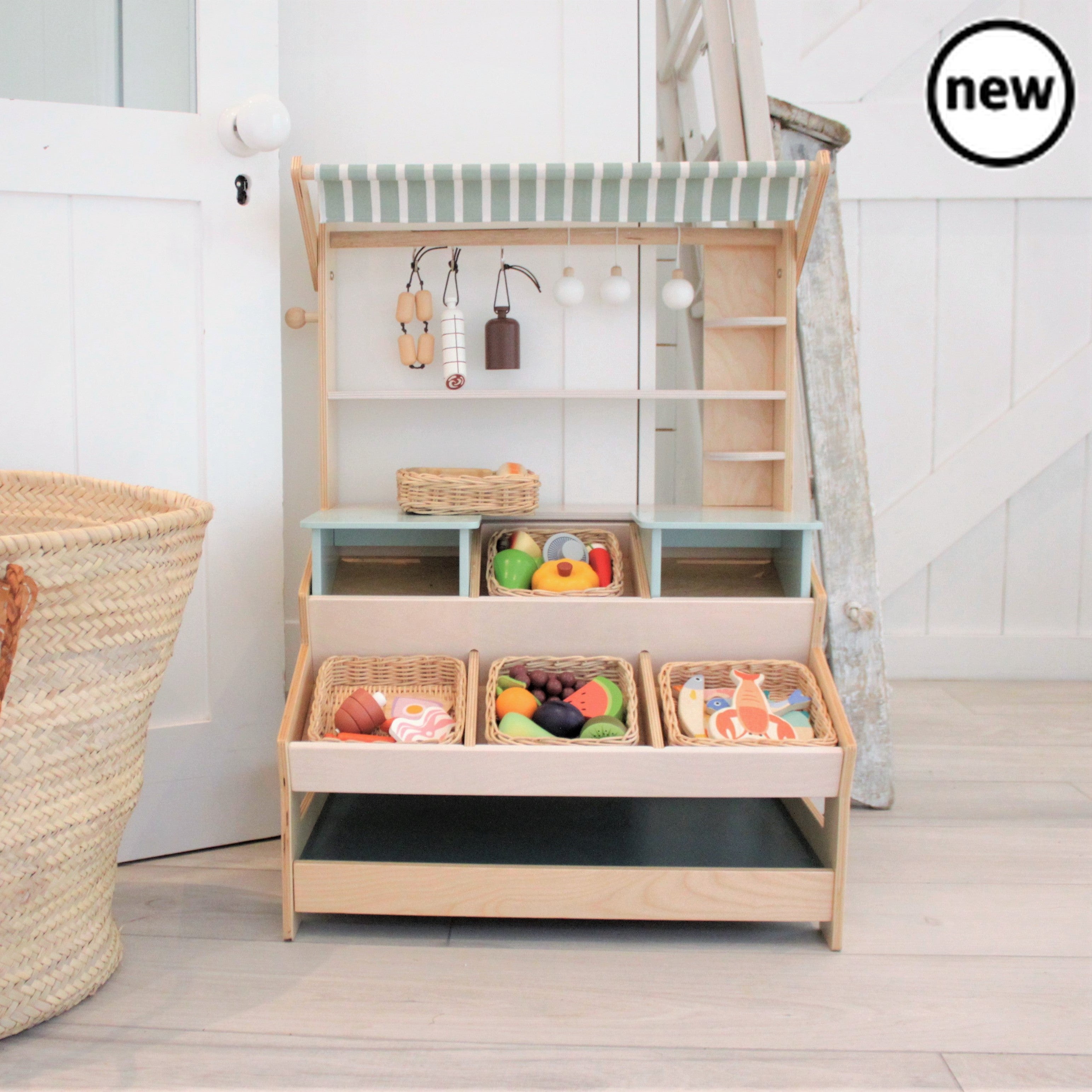 Tenderleaf Toys Wooden Market Stall with Shelves, Tenderleaf Toys Wooden Market Stall with Shelves,Wooden, Tenderleaf Toys Wooden Market Stall with Shelves,Tender Leaf General Stores is a market stall with shelves and two inter-changeable mini platforms so that it can be adapted to any kind of store. A lovely striped canopy can be lowered to protect your fresh produce from the sun, and at night there are three cute light bulbs you can use plus metal hooks to hang yourTender Leaf General Stores is a market s