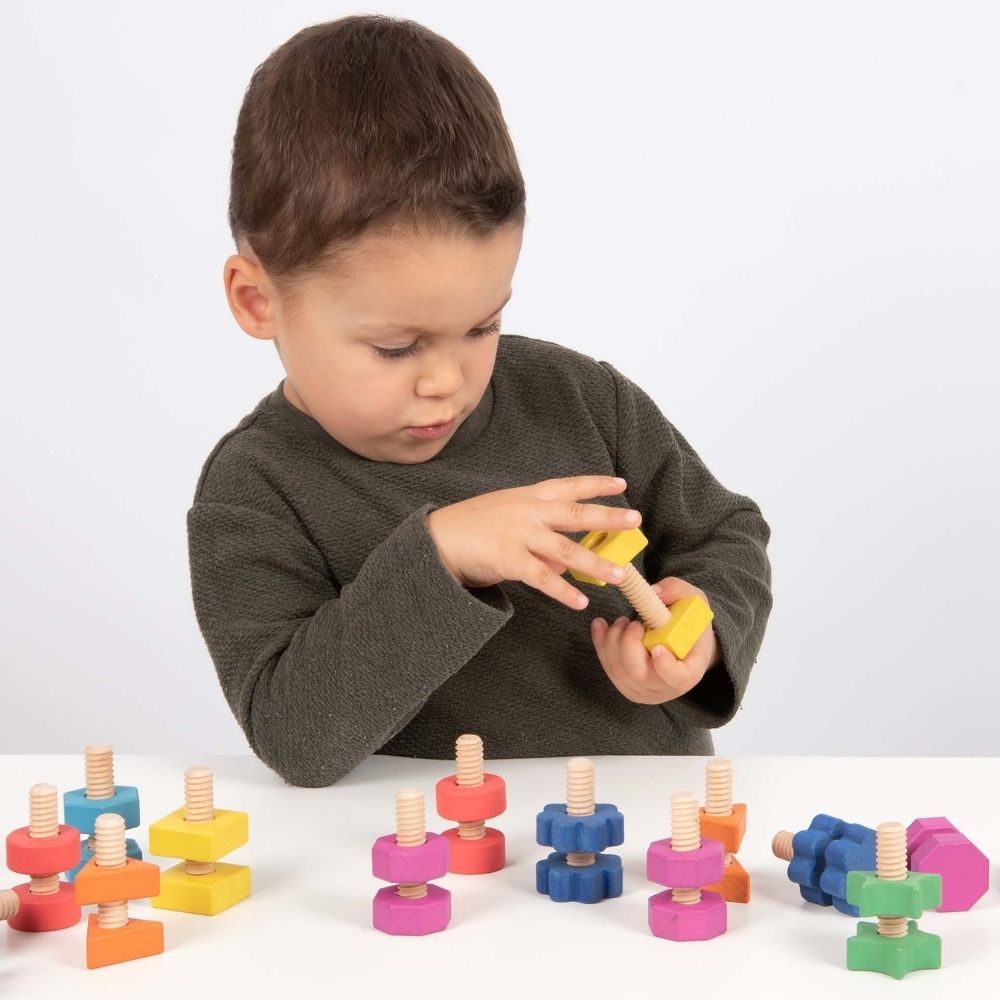 TickIt Rainbow Wooden Nuts & Bolts- Pk21, Rainbow Wooden Nuts & Bolts - Pk21,sensory toys,fine motor skills toys,fine motor skills toys resources,classroom resources fine motor skills, TickIt Rainbow Wooden Nuts & Bolts- Pk21,The TickIt Rainbow Wooden Nuts & Bolts contains be autiful solid beech wood nuts and bolts in seven different shapes and in the seven colours of the rainbow. Each Wooden nut has a corresponding matching bolt for pairing by colour and shape, and each shape has a different number of edge