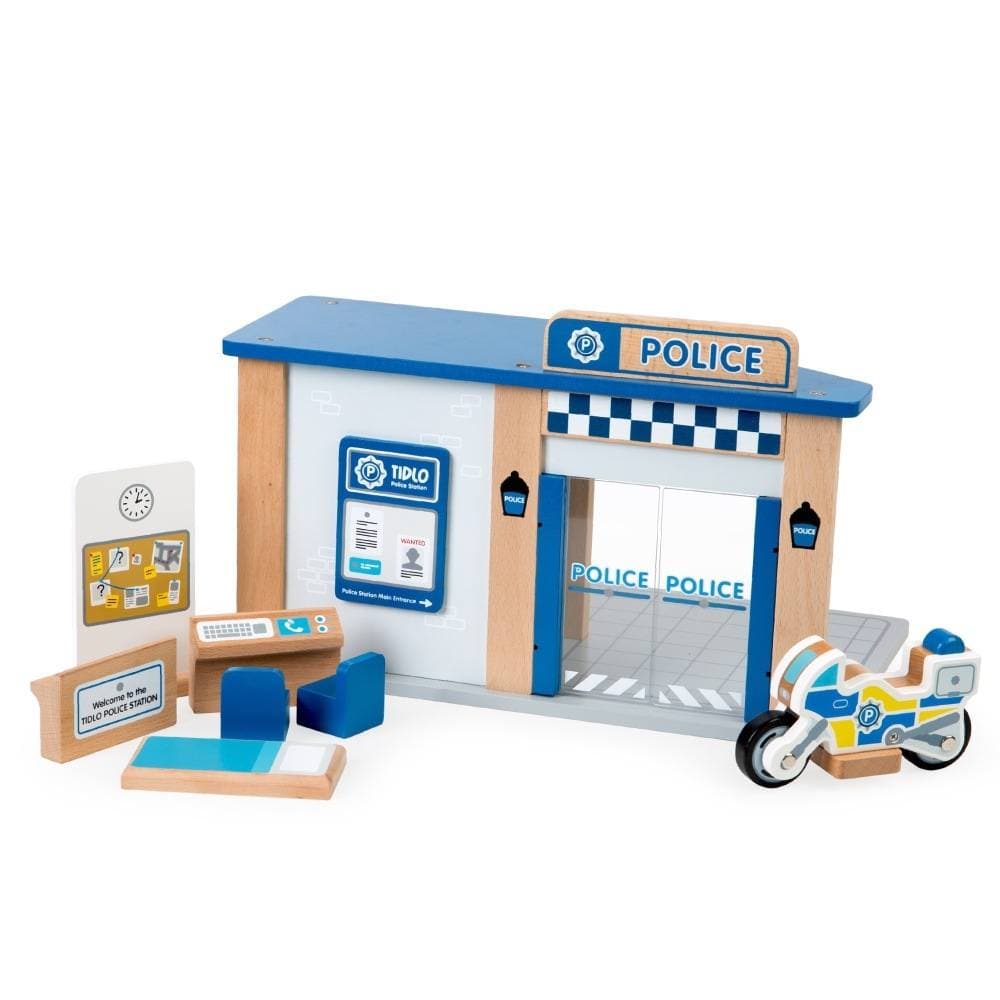 Tidlo Police Station Toy, Tidlo Police Station Toy.Wooden Role Play Toys, Bigjigs Toys,Wooden toys,Children's wooden toys, Tidlo Police Station Toy – A Fun and Engaging Law Enforcement Playset The Tidlo Police Station Toy is a dynamic and interactive wooden playset that transports children into the exciting world of law enforcement. With its detailed open-plan design, built-in jail, and realistic accessories, this playset encourages imaginative storytelling, role play, and skill development. Whether childre