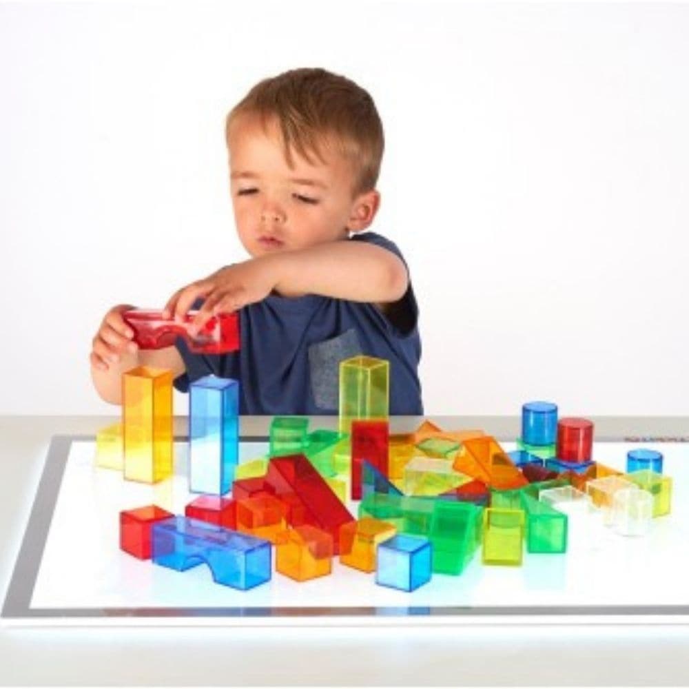 Translucent Colour Blocks, Translucent Colour Blocks,SENTOYS.CO.UK, Sen toys discount code, transparent colour toys,EYFS lightbox resources,EYFS Light panel resources, Translucent Colour Blocks,TickiT® Translucent Colour Blocks – A Colourful Exploration of Light, Shape, and Creativity Unlock a world of vibrant discovery with the TickiT® Translucent Colour Blocks. This set of 3D colour acrylic blocks in six different shapes provides children with an exciting way to engage in imaginative building and sensoryT