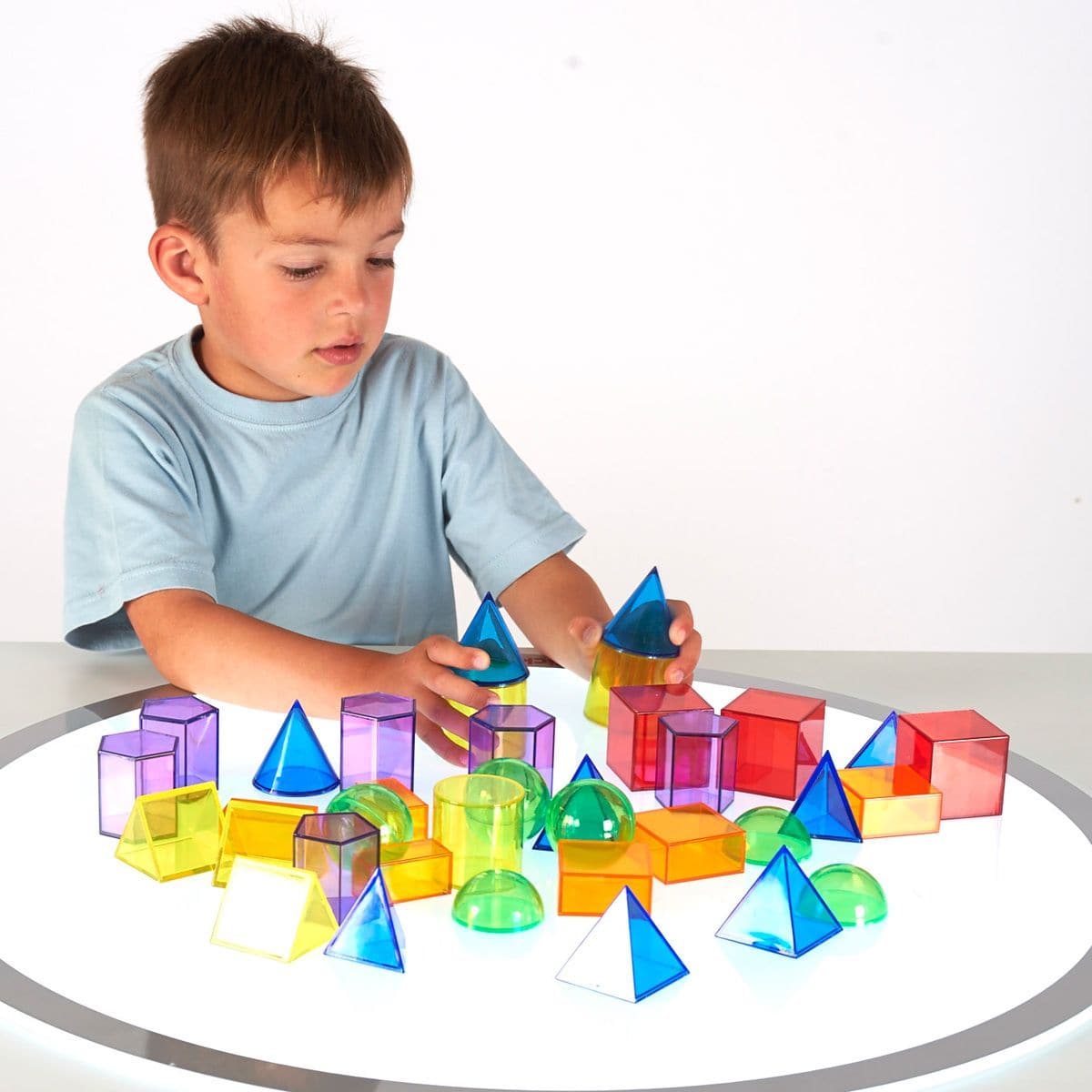 Translucent Geometric Shapes, Translucent Geometric Shapes,primary school Maths resources,primary school resources,light and sound resources for schools,geometric shapes early years, Translucent Geometric Shapes,Bring geometry to life with our Translucent Geometric Shapes Set—an engaging resource perfect for both educational and play environments. This vibrant set of 36 geometric shapes, spanning 12 different forms and 6 translucent colours, is designed to captivate young minds,Bring geometry to life with o