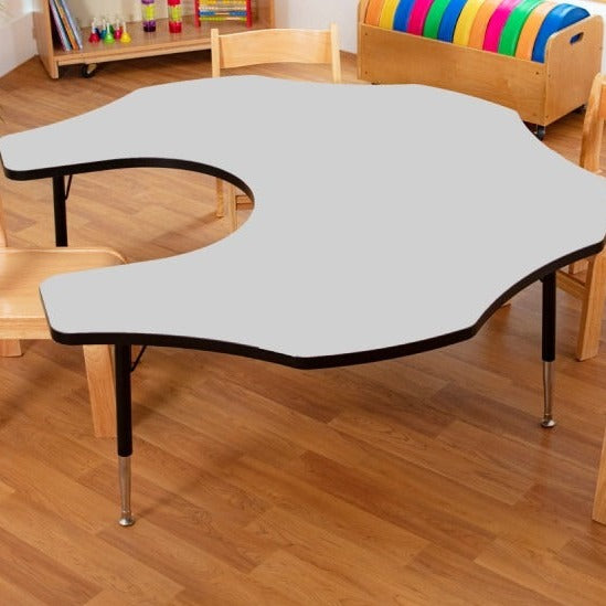 Tuf-Top Height Adjustable Teacher's Flower Table - Heavy Duty, , Tuf-Top Height Adjustable Teacher's Flower Table - Heavy Duty,These high quality Teacher's flower shaped adjustable height tables, classroom tables are suitable for heavy duty use with a sturdy 25 mm thick tough table top. Flower shaped table top: 1525 mm diameter Height is adjustable in 25 mm increments from 430 mm to 635 mm, suitable for ages up to 11 years Heavy dutyThese high quality Teacher's flower shaped adjustable height tables, classr