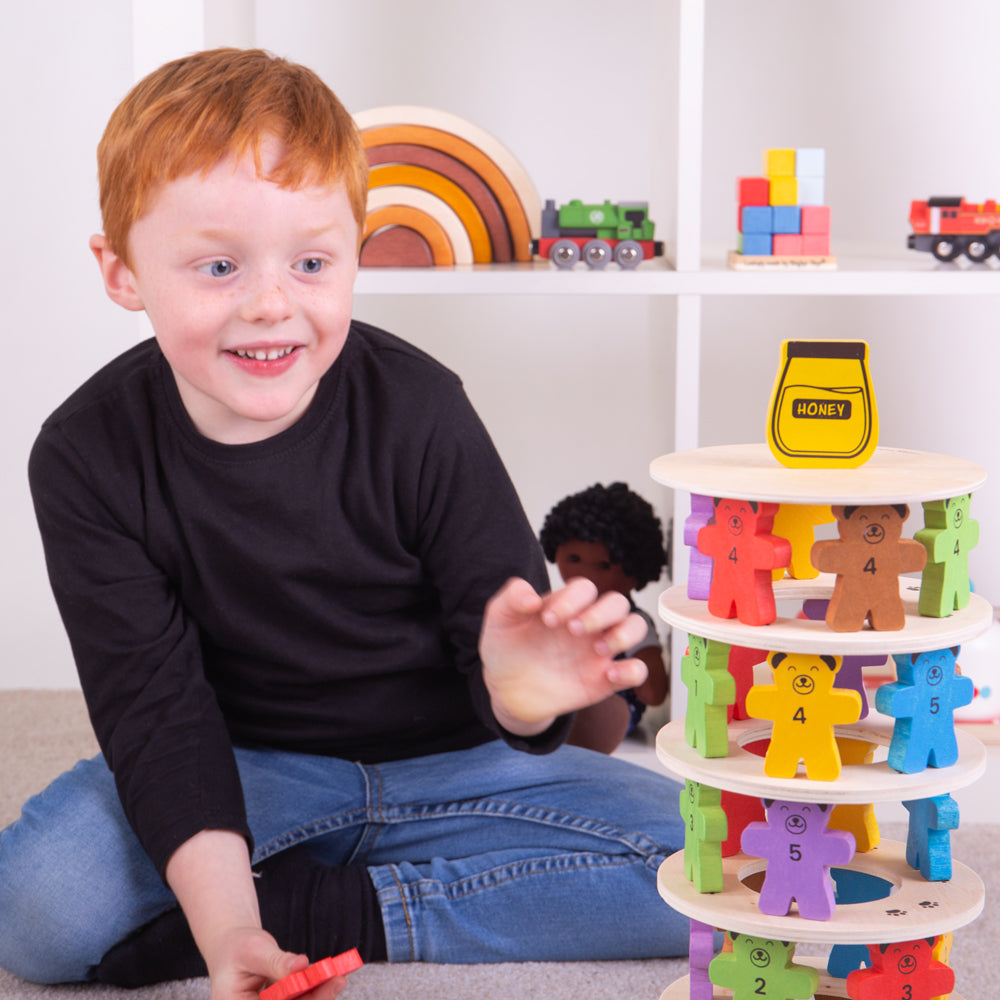 Tumbling Teddies, Tumbling Teddies,Wooden Tumbling Teddies,Wooden Toys,Bigjjigs toys,Tumbling Teddies, Tumbling Teddies,Who will be the first to knock the honey pot down? Kids can take it in turns to build their teddies up on each wooden ring with our fun Tumbling Teddies set. This playful wooden teddy bear game is great for interactive group play and encouraging children to use their strategyWho will be the first to knock the honey pot down? Kids can take it in turns to build their teddies up on each woode