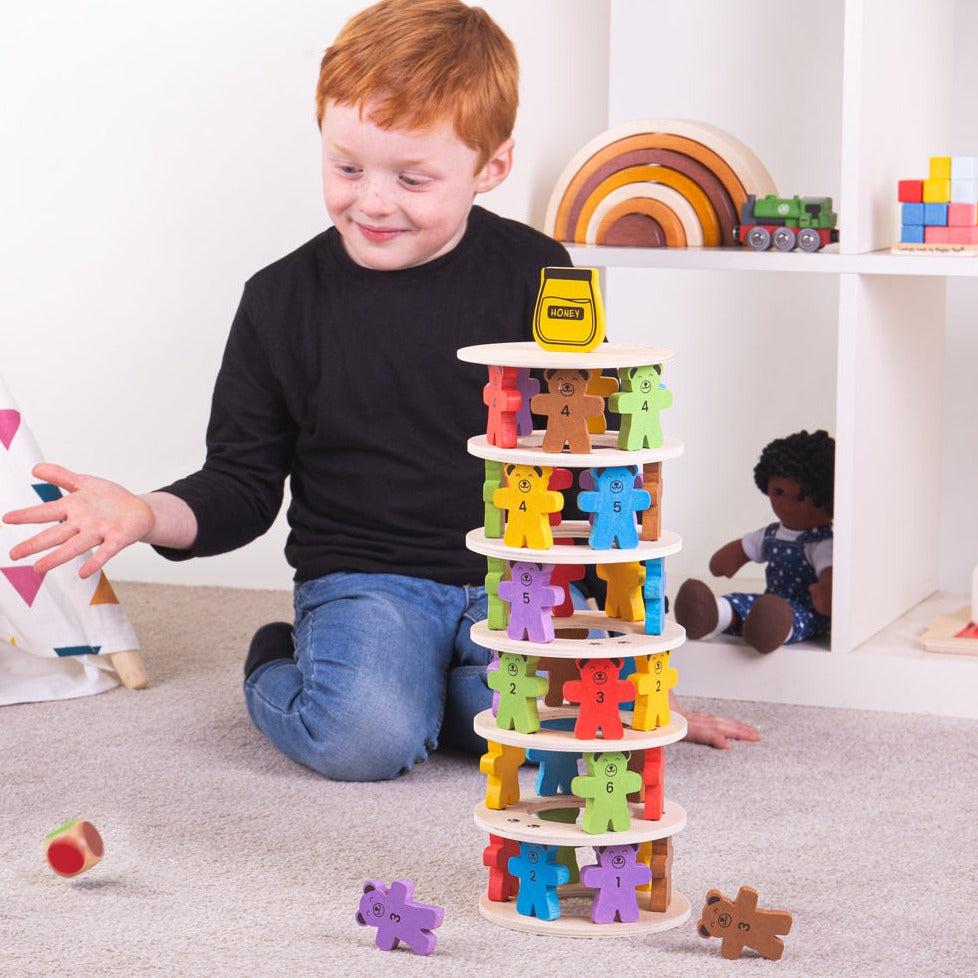 Tumbling Teddies, Tumbling Teddies,Wooden Tumbling Teddies,Wooden Toys,Bigjjigs toys,Tumbling Teddies, Tumbling Teddies,Who will be the first to knock the honey pot down? Kids can take it in turns to build their teddies up on each wooden ring with our fun Tumbling Teddies set. This playful wooden teddy bear game is great for interactive group play and encouraging children to use their strategyWho will be the first to knock the honey pot down? Kids can take it in turns to build their teddies up on each woode