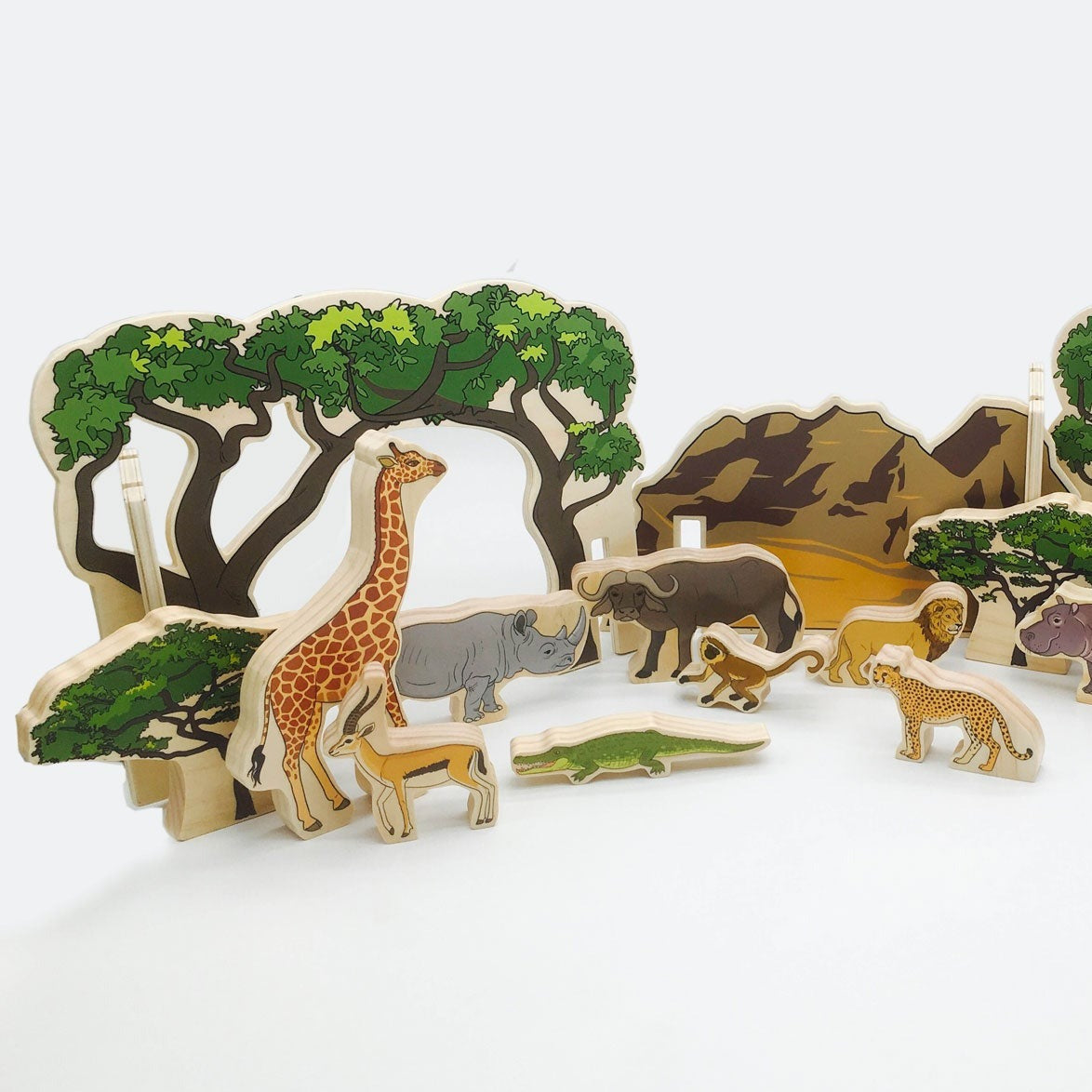 Wooden Animals In The Wild, Wooden Animals In The Wild,Wooden animal toys,Pretend play animals,wooden toys,Children's wooden toys, Wooden Animals In The Wild,The Wooden Animal Set is a top-quality product designed for children to foster their creativity and imagination. The set includes a range of beautifully illustrated wild animals, two wooden arched trees, a mountain range, and a wooden tree. The set is perfect for creating an exciting playscape for your little ones to e,Wooden Animals In The WildThe Woo