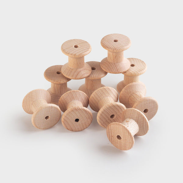 Wooden Spool Set 10pk, Wooden Spool Set 10pk.Heuristic Play,Heuristic Play babies,baby Heuristic Play,toddler Heuristic Play,Heuristic Play resources,Heuristic Play ideas, Wooden Spool Set 10pk,The Wooden Spool Set 10pk is crafted to spark curiosity and inspire imaginative play in toddlers. These simple yet versatile wooden spools offer endless play possibilities, rooted in heuristic play that nurtures children’s natural urge to explore, discover, and experiment.The Wooden Spool Set 10pk is crafted to spark