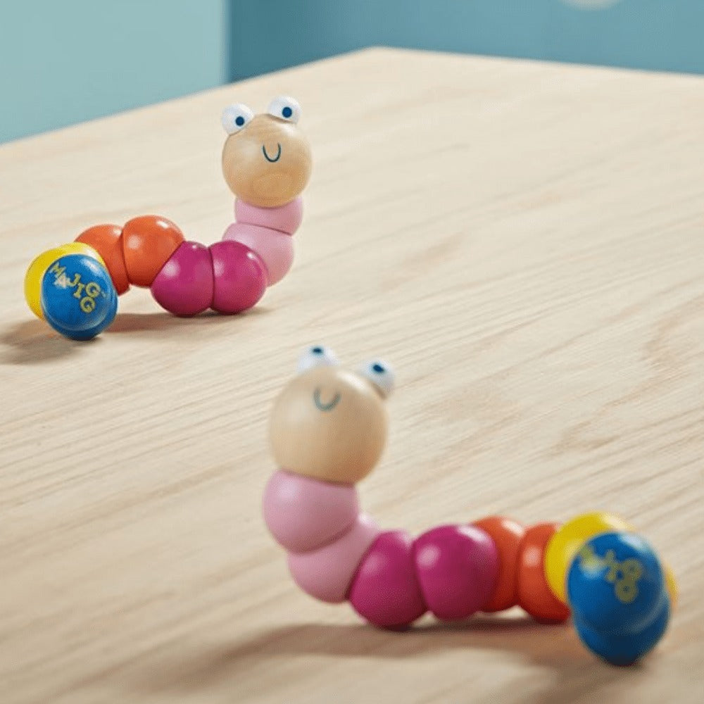 Woodie the worm - Pink, Woodie the worm - Pink. woodie worm fidget toy,woody worm toy,fidget toy, Woodie the worm - Pink,Introducing Woodie Worm - a delightful character designed for endless play and amusement. Crafted with care and precision, Woodie Worm promises to be your child's favorite toy in no time. Key Features: High-Quality Materials: Made from premium, durable wood, ensuring long-lasting play without any wear or tear. Vibrant ,Woodie the worm - PinkIntroducing Woodie Worm - a delightful character