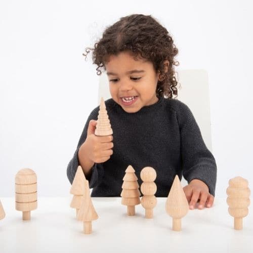 Woodland Trees Set - Pk10, Woodland Trees Set - Pk10,Wooden toys,Pretend play toys,wooden pretend play toys, TickiT® Wooden Woodland Trees – Inspire Nature-Inspired Play & Learning Introduce your child to the beauty of nature with the TickiT® Wooden Woodland Trees, a stunning set of 10 smooth, solid beechwood trees designed to inspire imaginative play, creativity, and early learning development. Featuring a natural woodgrain finish and a variety of shapes and sizes, these beautifully crafted Woodland trees 