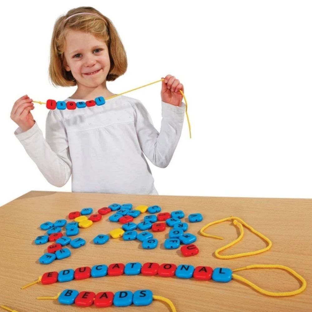 Alphabet Threading Beads, Alphabet Threading Beads,Phonics resources,classroom resources.Alphabet Posting Letters Game,independent learning and assessment of Phase 2 phonics,Phonics resources,classroom resources, Alphabet Threading Beads,Bright and colourful chunky beads of lower and uppercase letters, Alphabet Threading Beads are perfect for reinforcing letter recognition, alphabet sequencing and spellings. Threading letter beads with vowels in red, consonants in blue and Infant Sassoon font. Beads measure