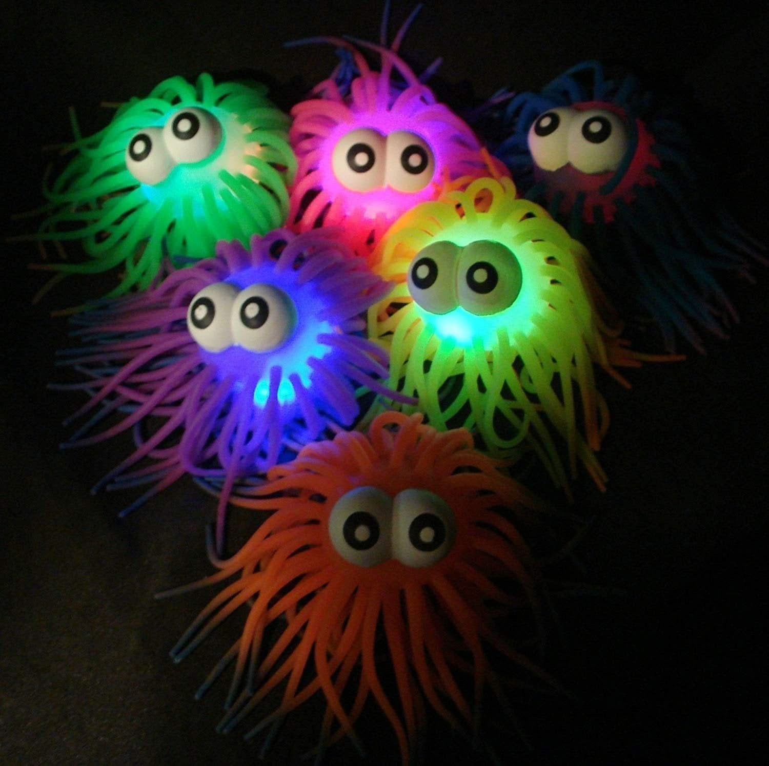 Big Eye Tentacle Ball, Big Eye Tentacle Ball,light up balls,electromites flashing stretchy balls,electromite light up balls,light up electromite spikey balls,tobar electromites balls,light up smile sizzler ball,flashing smile sizzler ball,light up stretchy tactile ball,flashing stretchy tactile ball,light up stretchy smiley face balls,flashing stretchy smiley face balls,light up stretchy tentacles balls,flashing stretchy tentacles balls, Big Eye Tentacle Ball,Introducing our beloved Rainbow Tentacle Balls -