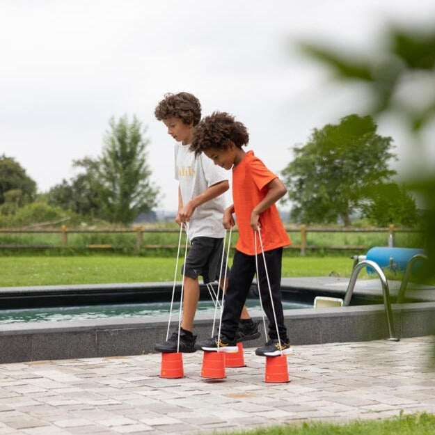 Bucket Balance Stilts, Plastic balance Bucket Stilts,balance toys and games, early years resources, educational resources, educational materials, childrens learning resources, childrens learing materials, teaching resources for children, teaching material for children, Bucket Balance Stilts,Launch your outdoor stomping fun to whole new heights with the Bucket Balance Stilts High quality braided polypropylene line is used for the handles to ensure durability and a good grip for little hands while strong plas