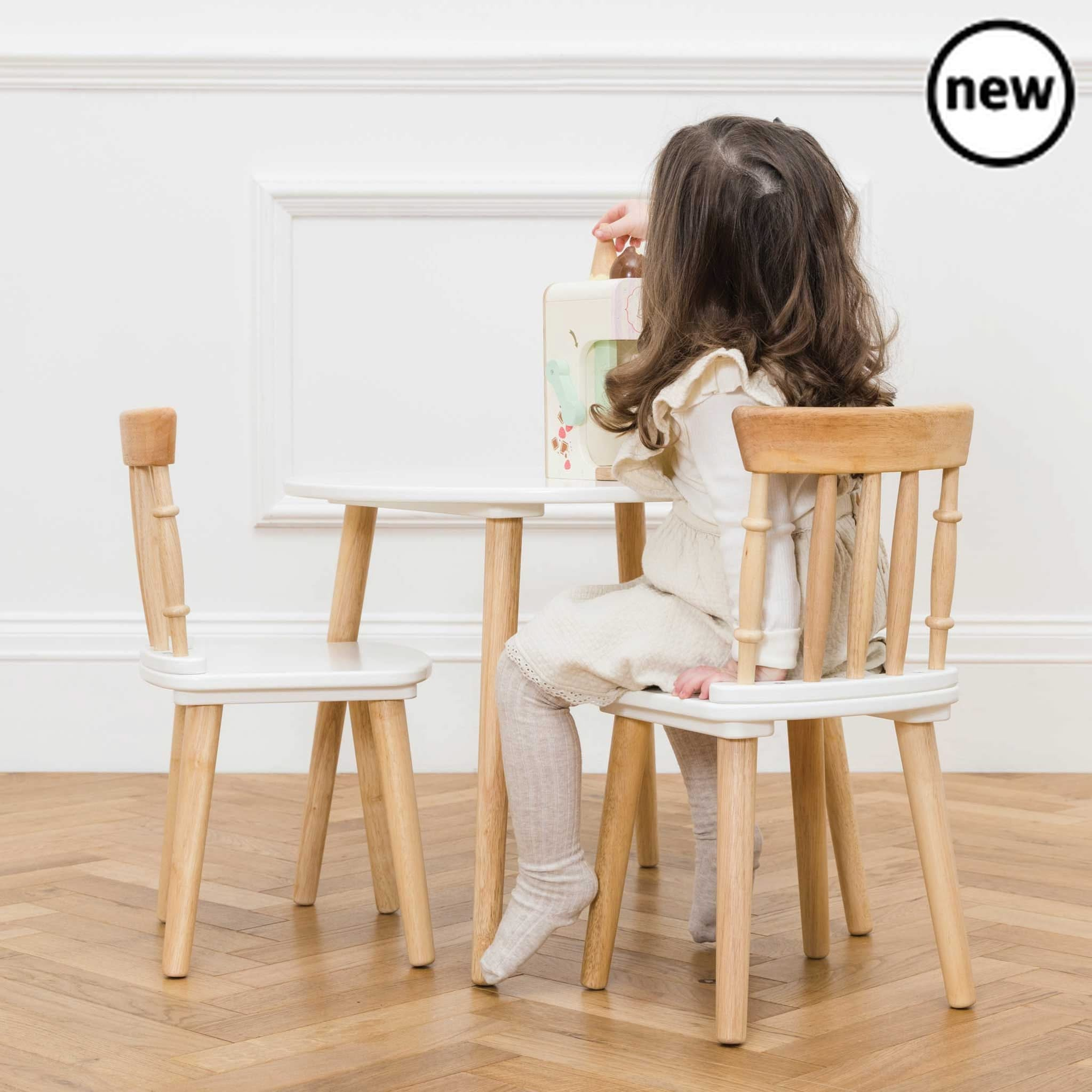 Children's Wooden Table and Chairs, Children's Wooden Table and Chairs,Childrens wooden tables, Table and Chairs,Description This charming children's table and chairs set makes a great addition to your littles ones room or playroom. The perfect spot for crafting, eating, reading and role play fun adventures! This multifunctional set is a real must have. With it's timeless appeal and stunning design, it is crafted from solid, sust,Table andChildren's Wooden Table and Chairs – A Timeless & Versatile Playtime 