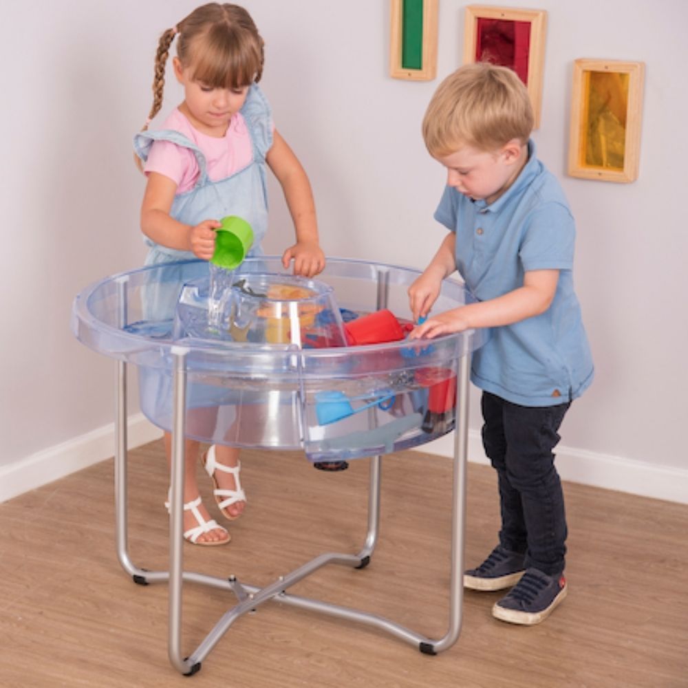 Circular Water Tray and Stand, Circular Water Tray and Stand.Circular Water Tray,Clear Sand and Water Table With Lid,children's water play table,childrens water table,childrens sand and water play, Circular Water Tray and Stand,The Circular Water Tray and stand set is a cleverly designed and versatile clear sand and water tray with central helter skelter for use as a water channel or roadway and an outer trough which together stimulate imaginative play. The Circular Water Tray and stand isThe Circular Water