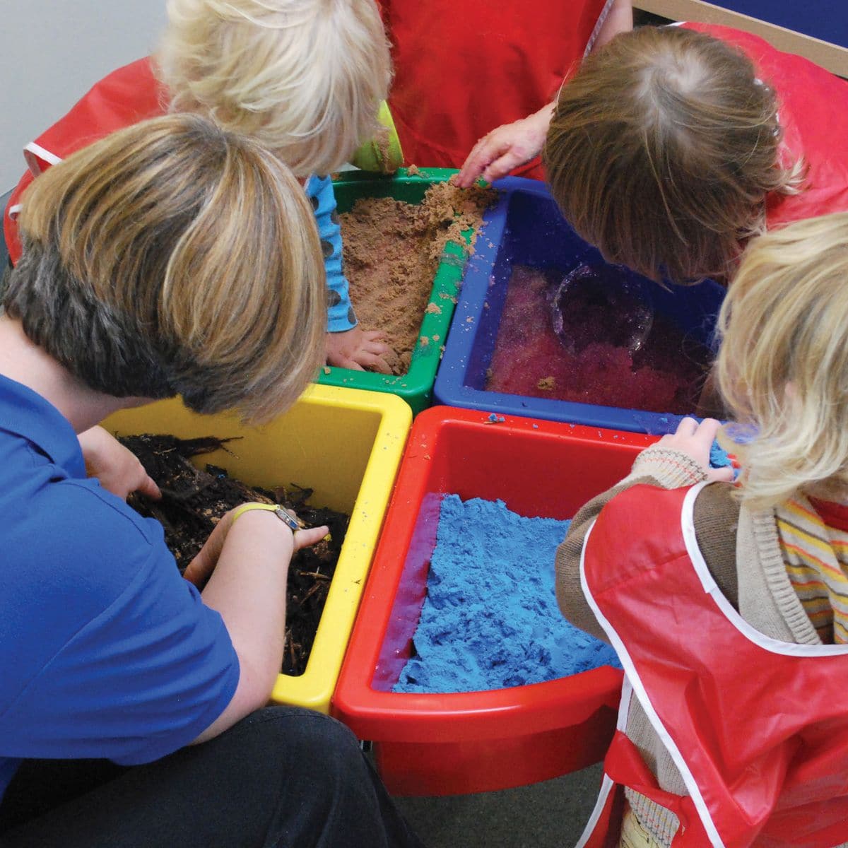 Exploration Circle Set Colour Trays, Exploration Circle water tray Set Colour Trays,messy play, water play, sand, medium, media, tactile, trays, materials, school, activity, play,Clear Sand and Water Play Tray with Blue Stand,childrens water tray table,childrens sand and watertray table,school water table,sensory play table, Exploration Circle Set Colour Trays,The Exploration Circle Set Colour Trays has 4 coloured quadrant trays with a grey metal stand forming a sturdy activity circle. Using the Exploration