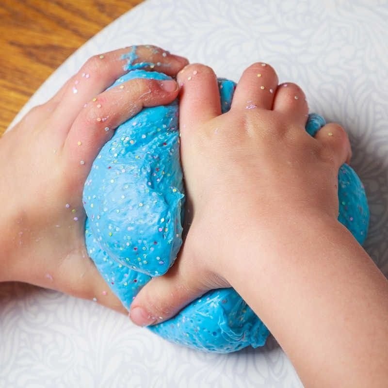 Giant Glittery Fluffy Putty, Giant Glittery Fluffy Putty,Glittery Fluffy Putty,Fluffy Putty,sensory putty,thinking putty,putty toys,special needs toys,sensory toys,calming putty,sensory toys that calm a child, Giant Glittery Fluffy Putty,Giant Glittery Fluffy Putty – A sensory masterpiece for both visual and tactile stimulation! This large tub of putty is filled with tiny, snow-like flecks and sparkling glitter, creating a stunning visual effect while delivering a satisfying sensory experience. StretchGiant