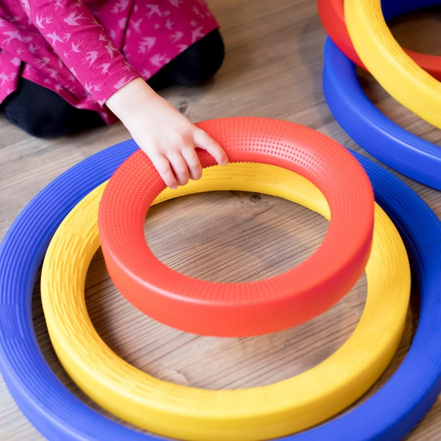 Giant Plastic Activity Rings Set, Giant Plastic Activity Rings Set,school numeracy resources,classroom numeracy resources, Giant Activity Rings – A Versatile Set for Active Play & Learning Transform playtime into an engaging and educational experience with the Giant Activity Rings Set! Designed to encourage movement, creativity, and sensory exploration, these durable plastic rings offer endless opportunities for active play—both indoors and outdoors. This 9-piece set features rings in three different sizes—