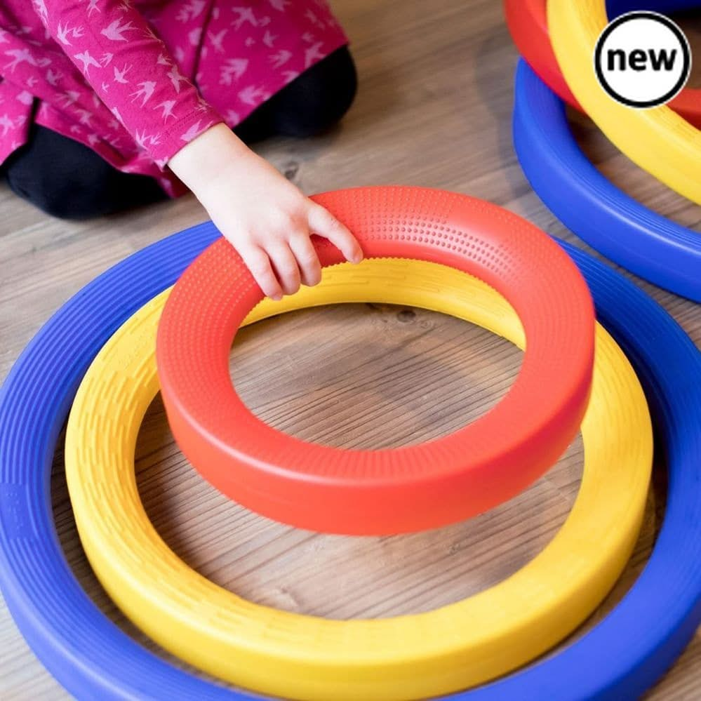 Giant Plastic Activity Rings Set, Giant Plastic Activity Rings Set,school numeracy resources,classroom numeracy resources, Giant Activity Rings – A Versatile Set for Active Play & Learning Transform playtime into an engaging and educational experience with the Giant Activity Rings Set! Designed to encourage movement, creativity, and sensory exploration, these durable plastic rings offer endless opportunities for active play—both indoors and outdoors. This 9-piece set features rings in three different sizes—