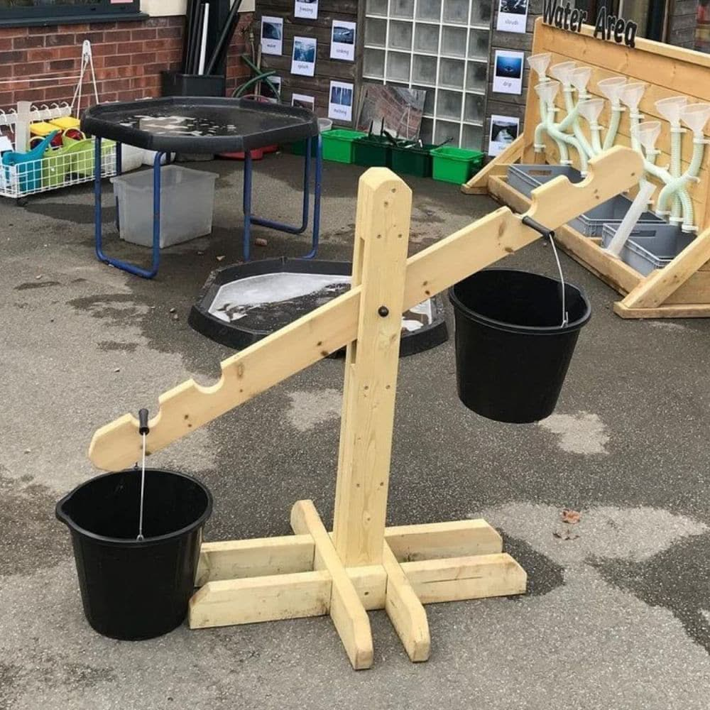 Giant Wooden Outdoor Scales, Giant Wooden Outdoor Scales,Messy Multiplay Table,Mud Kitchen Large,Mud Kitchen,Mud kitchen,sensory mud kitchen,mud kitchen school,nursery mud kitchen,playground equipment storage,playground storage equipment,outdoor wooden storage, Giant Wooden Outdoor Scales,Children will love experimenting with these beautifully made, giant outdoor wooden scales and buckets.The Giant Wooden Outdoor Scales are a super addition to the outdoor learning environment, enhancing provision and inspir