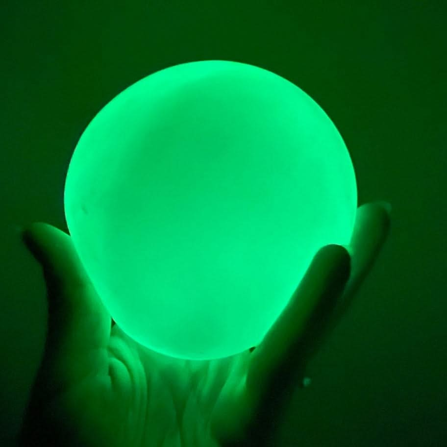 Glow in the Dark Squish Ball Fidget Toy, Glow in the Dark Squish Ball Fidget Toy, Glow in the dark squish ball. glow in the dark fidget toys, glow in the dark sensory toys, Glow in the Dark Squish Ball Fidget Toy – The Ultimate Stress Reliever! Introducing the Glow in the Dark Squish Ball, a super fun and calming fidget toy that glows bright green in the dark! While it appears as an 'off white' colour in normal light, this squishy ball glows with a vibrant green hue after exposure to light or under UV black