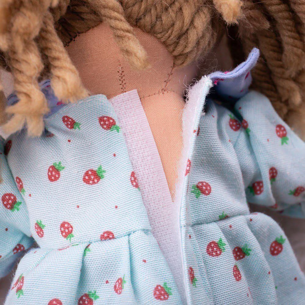 Grace Doll - Small, , Grace Doll - Small,Introducing Grace, a soft and cuddly rag doll that aims to be your child's new favorite companion. With her sweet blue dress adorned with a delightful strawberry pattern and her hair styled in cute bunches, she's all set to win your little one's heart. Key Features: Soft and Cuddly: Grace is made from soft materials th,Grace DollIntroducing Grace, a soft and cuddly rag doll that aims to be your child's new favorite companion. With her sweet blue dress adorned with a 