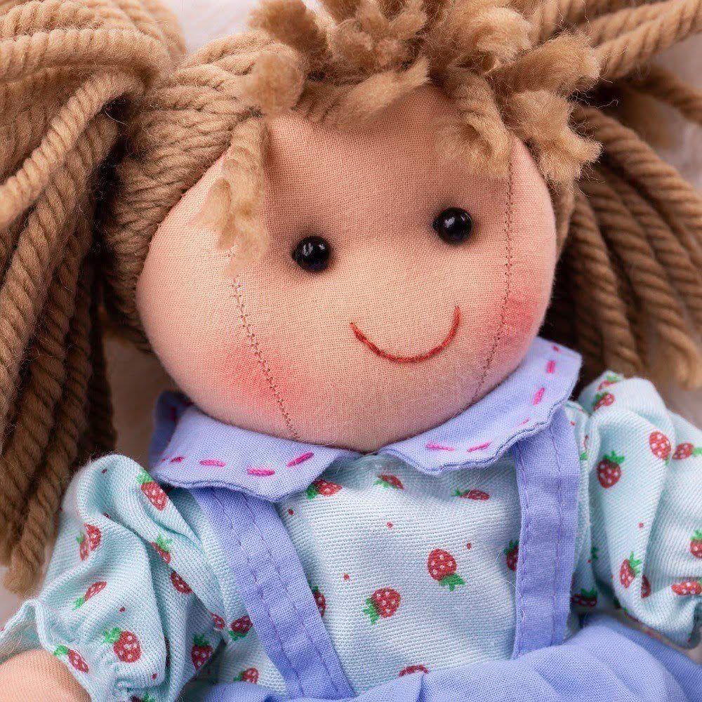 Grace Doll - Small, , Grace Doll - Small,Introducing Grace, a soft and cuddly rag doll that aims to be your child's new favorite companion. With her sweet blue dress adorned with a delightful strawberry pattern and her hair styled in cute bunches, she's all set to win your little one's heart. Key Features: Soft and Cuddly: Grace is made from soft materials th,Grace DollIntroducing Grace, a soft and cuddly rag doll that aims to be your child's new favorite companion. With her sweet blue dress adorned with a 