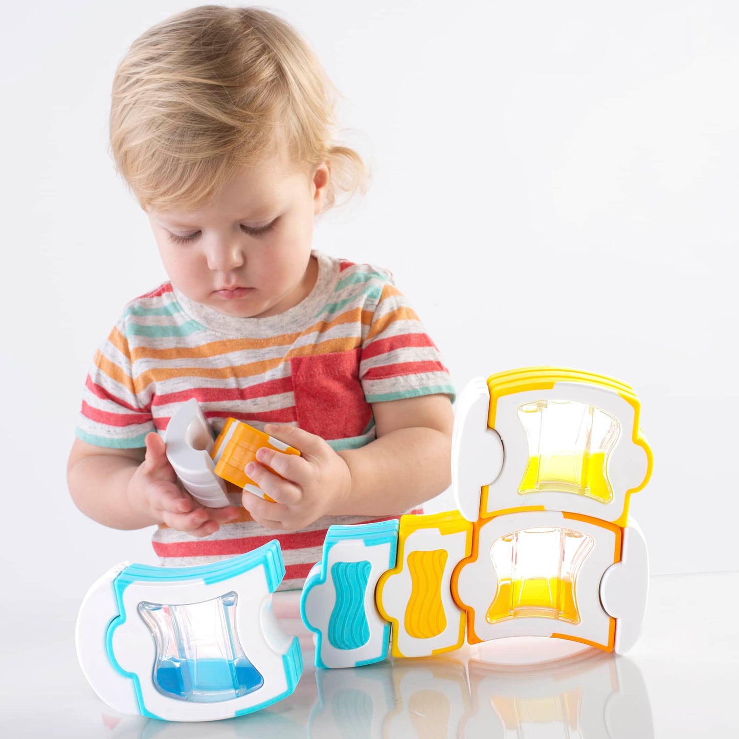 Grippies Waves 12 Piece Set, Grippies Waves 12 Piece Set,Grippies® Waves – 12 pc. Set,Guidecraft Grippies Uk,Guidecraft UK, Grippies Waves 12 Piece Set,Grippies Waves 12 Piece Set Introduce toddlers to the mesmerizing world of magnetic building with the Grippies Waves 12 Piece Set, where soft-coloured liquids inside each piece create a soothing and engaging motion. With magnetic connectivity, tactile grips, and a softGrippies Waves 12 Piece Set Introduce toddlers to the mesmerizing world of magnetic buildin