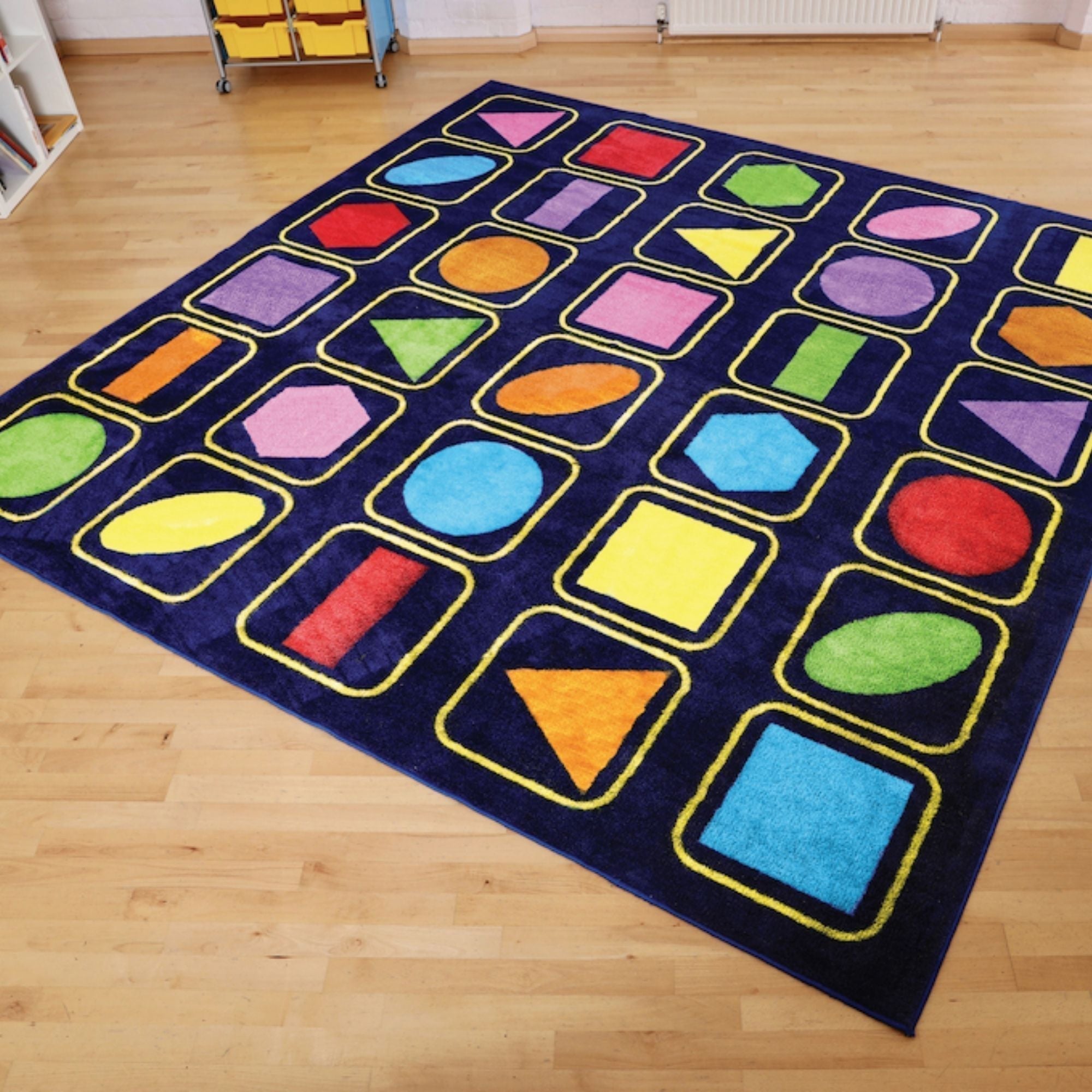 Kindercolour Geometric Shapes Carpet 3 X 3 Metre, Kindercolour Geometric Shapes Carpet 3 X 3 Metre,Kindercolour™Geometric Shapes Carpet 3 X 3 Metre,,Classroom carpets,Children's carpets,children's story time carpets and cushions,classroom carpets,primary school carpets and rugs, Kindercolour Geometric Shapes Carpet 3 X 3 Metre,The Kindercolour™Geometric Shapes Carpet is a huge 3m square placement carpet with clearly recognisable seating areas for up to 30 children. These brightly coloured basic shapes aid s