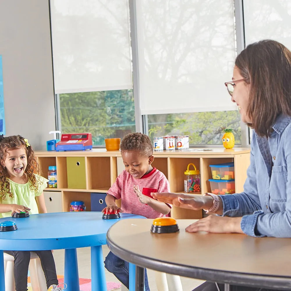 Learning Resources Lights & Sounds Answer Buzzers, These fun, colourful Lights & Sounds Answer Buzzers turn any activity into a game while keeping even the youngest children engaged! The Lights & Sounds Answer Buzzers Set includes 4 brightly coloured buzzers (blue, red, green and yellow) that light up when pressed. Each Lights & Sounds Answer Buzzer features a unique sound for easy differentiation – siren, game-show, laser and charge. Liven up any game with these colourful flashing answer buzzers! Create ga