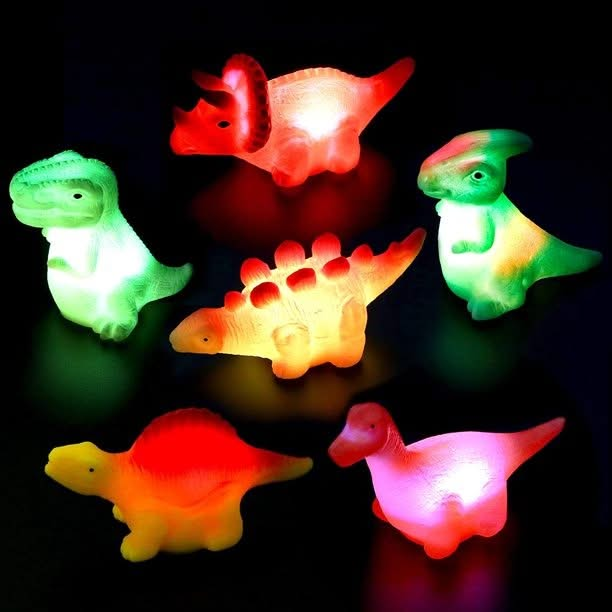 Light Up Dinosaur Bath Toy, Light up dinosaur bath toy,Light Up T-Rex Bath Toy,colour changing bath toys,cheap bath toys,bath ducks,childrens bath toys,bath toys,bath toys for toddlers,special needs bath toys,special needs bath games and toys, Light Up Dinosaur Bath Toy,Make bath time an exciting adventure with the Light Up Dinosaur Bath Toy! This incredible water activated bath light is shaped like a fearsome dinosaur and will instantly light up and flash as soon as it touches the water. Watch as your litt