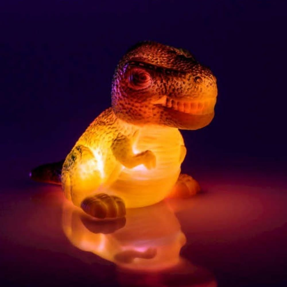 Light Up Dinosaur Bath Toy, Light up dinosaur bath toy,Light Up T-Rex Bath Toy,colour changing bath toys,cheap bath toys,bath ducks,childrens bath toys,bath toys,bath toys for toddlers,special needs bath toys,special needs bath games and toys, Light Up Dinosaur Bath Toy,Make bath time an exciting adventure with the Light Up Dinosaur Bath Toy! This incredible water activated bath light is shaped like a fearsome dinosaur and will instantly light up and flash as soon as it touches the water. Watch as your litt