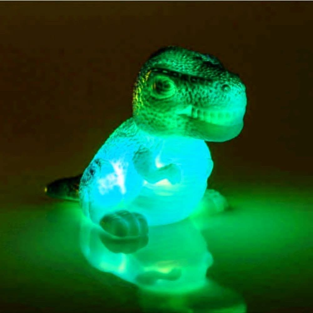 Light Up Dinosaur Bath Toy, Light up dinosaur bath toy,Light Up T-Rex Bath Toy,colour changing bath toys,cheap bath toys,bath ducks,childrens bath toys,bath toys,bath toys for toddlers,special needs bath toys,special needs bath games and toys, Light Up Dinosaur Bath Toy,Make bath time an exciting adventure with the Light Up Dinosaur Bath Toy! This incredible water activated bath light is shaped like a fearsome dinosaur and will instantly light up and flash as soon as it touches the water. Watch as your litt