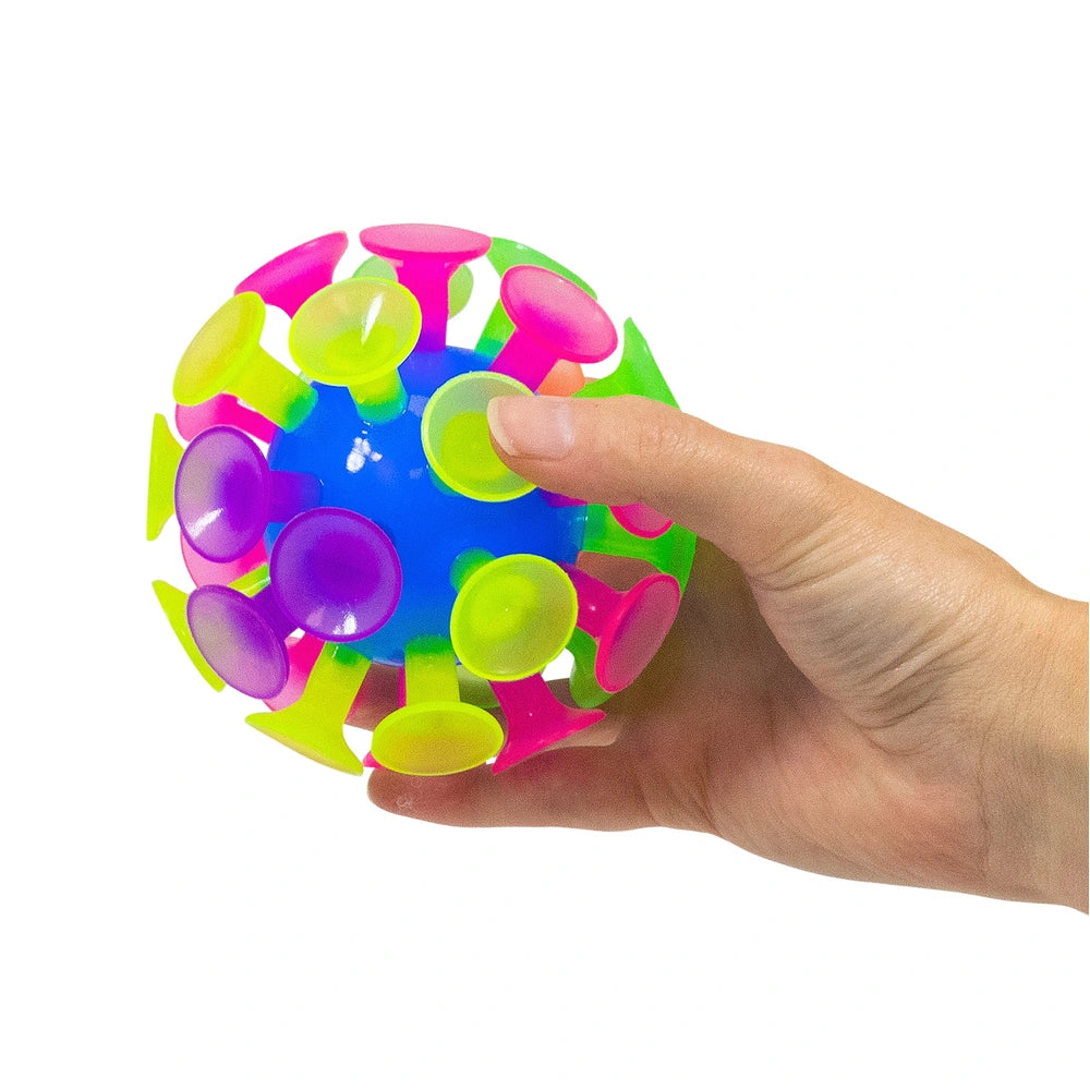 Light Up Sucker Ball, Light Up Sucker Ball,Flashing sucker ball,sensory sucker ball,flashing sensory ball,sensory balls, Light Up Sucker Ball,Light Up Sucker Ball – A Flashy, Sticky Sensory Delight! Get ready for endless fun with the Light Up Sucker Ball! Toss this silly suction cup ball against a wall and watch it smack and stick, creating a fun, interactive experience. As it rolls down, enjoy the delightful "popping" sound of each suction cup as it detache,Light UpLight Up Sucker Ball – A Flashy, Sticky S