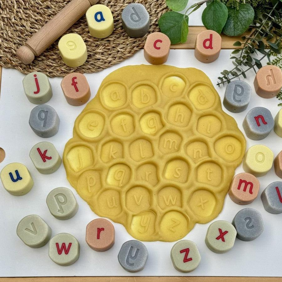 Lowercase Alphabet Stamping Stones, Lowercase Alphabet Stamping Stones,Dough Stampers,Alphabet stampers, Lowercase Alphabet Stamping Stones – A Tactile and Engaging Literacy Resource Make early literacy learning fun, hands-on, and interactive with Lowercase Alphabet Stamping Stones! These chunky, durable stampers provide a tactile approach to letter recognition, phonics, and word-building, making them a fantastic resource for young learners. Designed for small hands, these easy-to-grip stones help children 