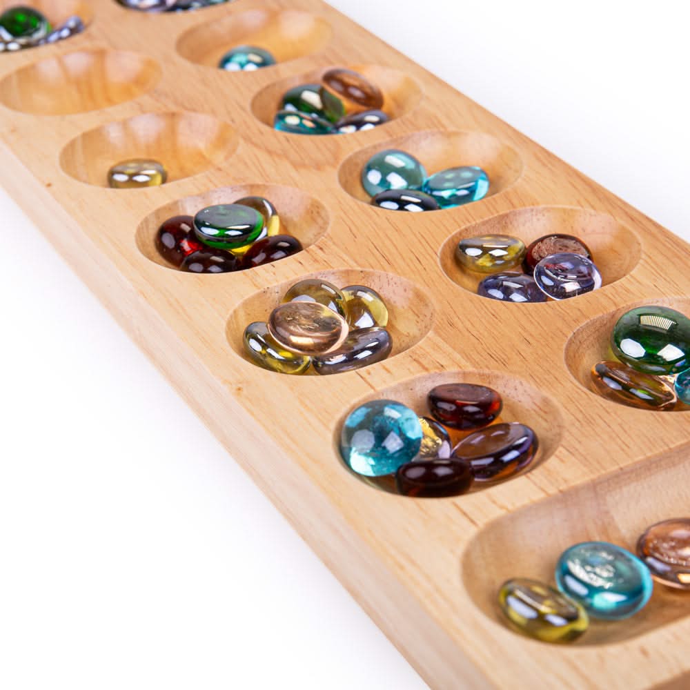 Mancala, Mancala,Bigjigs Mancala Game,Wooden Mancala Game,Counting Game, Bigjigs Mancala Game – A Classic Strategy Game for All Ages! Experience the timeless fun of Mancala, a strategic two-player board game that has been enjoyed for centuries. The Bigjigs Mancala Game combines tactical thinking, counting skills, and strategy, making it a perfect family-friendly game for players of all ages. Crafted from high-quality, responsibly sourced wood, this beautifully designed traditional board game is both durable