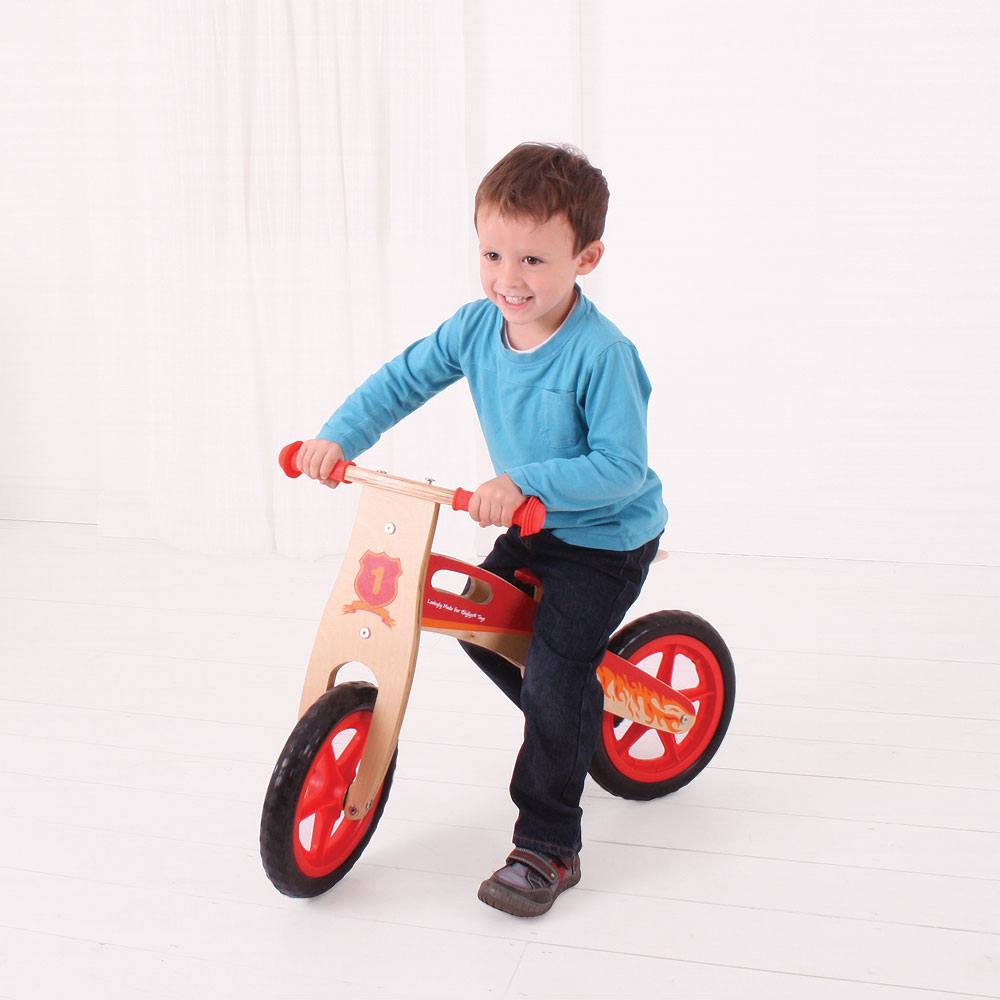 My First Balance Bike Red, This wooden Red Balance Bike is a great way for youngsters to start a journey towards full two-wheeled mobility! The Red Balance Bike features a padded, adjustable seat, long lasting solid tyres and easy to grip handle bars. Just push forwards and go! An excellent way to improve balance whilst further developing hand/eye co-ordination. Made from high quality, responsibly sourced materials. Conforms to current European safety standards. Suitable for kids aged 3 years and up. Weight