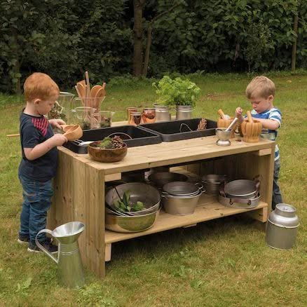 Outdoor Wooden Group Discovery Table, Outdoor Wooden Group Discovery Table,Outdoor messy play,early years messy play ideas,tactile sensory activities,school Playground equipment,school playground equipment,school playground, Outdoor Wooden Group Discovery Table,The Outdoor Wooden Group Discovery Table is a large outdoor wooden table with a storage shelf and plastic basins. The Outdoor Wooden Group Discovery Table has enough space for lots of children and table space to experiment. Children can transfer mate