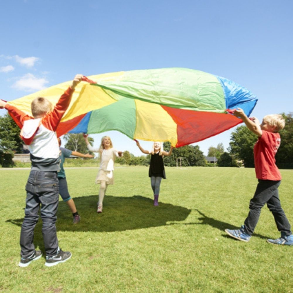 Parachute Games 9 metres, Parachute play is a novel and fun way of encouraging new skills and development. This 9 Metre Parachute is colourful and sometimes calming, it can create soft, whispering sounds, or loud rippling noises, depending on how quickly it is moved. Working together encourages co-operation, trust, communication and social skills. Parachute Games also encourage movement of muscles in the upper body. Games can involve touching the soft parachute fabric, moving or lying beneath or over it, an