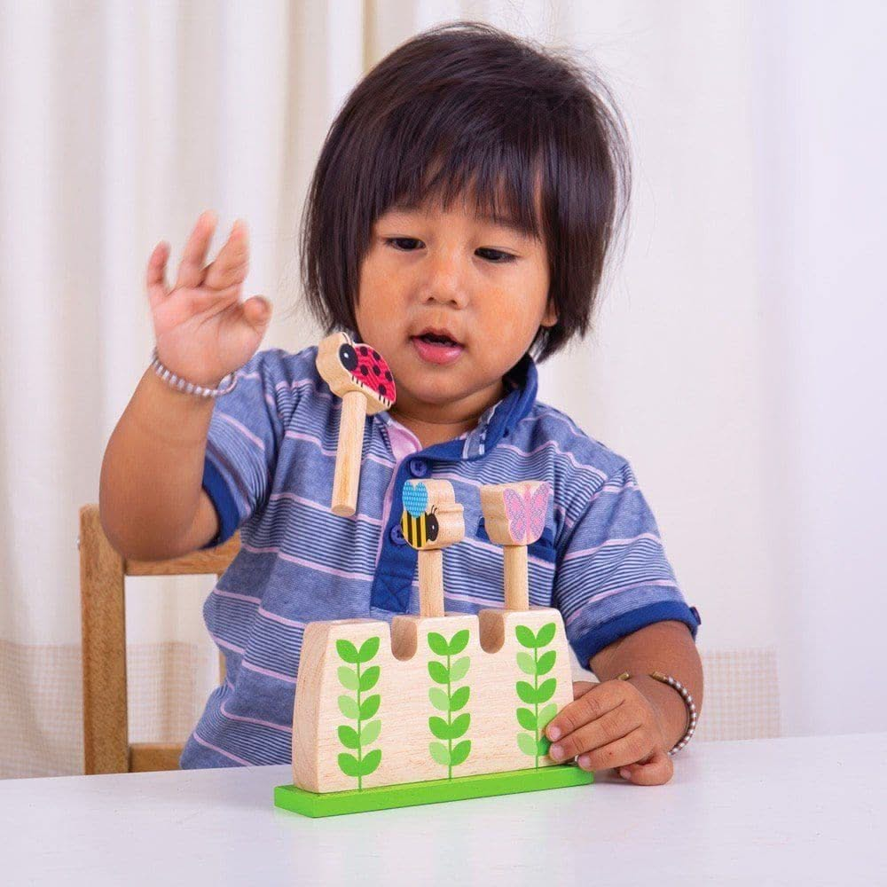 Pop Up Garden Bugs, , Pop Up Garden Bugs,Watch the adorable wooden bugs 'pop' up from the garden plants! This amusing toy will see youngsters entertained for hours, as they insert the bugs into the slots and then watch them jump out. A thrilling way for children to develop hand-eye coordination and dexterity.The Pop Up Garden Bugs toy is made from high qualit,Pop UpWatch the adorable wooden bugs 'pop' up from the garden plants! This amusing toy will see youngsters entertained for hours, as they insert the b