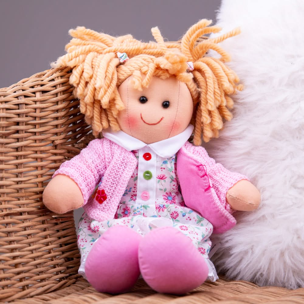 Poppy Doll - Small, , Poppy Doll - Small,Poppy Doll is ready to meet her new little best friend! Poppy is a soft and cuddly ragdoll dressed in an adorably cute outfit. This soft and cuddly doll is a fashion trendsetter with her bright dress and cute pink cardigan. She's kind and loving and likes nothing more than to share a secret and a hug. Poppy Doll’s soft,Poppy DollPoppy Doll is ready to meet her new little best friend! Poppy is a soft and cuddly ragdoll dressed in an adorably cute outfit. This soft and