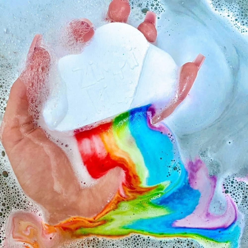 Rainbow Cloud Baff Bomb, Rainbow Cloud Baff Bomb,sensory bath bombs,sensory bath toys,Zimpli Kids Rainbow Cloud Baff Bomb, Rainbow Cloud Baff Bomb,Rainbow Cloud Baff Bomb – A Magical, Colourful Bath Adventure Turn bath time into a dazzling spectacle with the Rainbow Cloud Baff Bomb! This enchanting bath bomb creates a fizzing, bubbling rainbow effect as soon as it hits the water, transforming your bath into a swirl of vibrant colours. Perfect for sparkingRainbow Cloud Baff Bomb – A Magical, Colourful Bath A