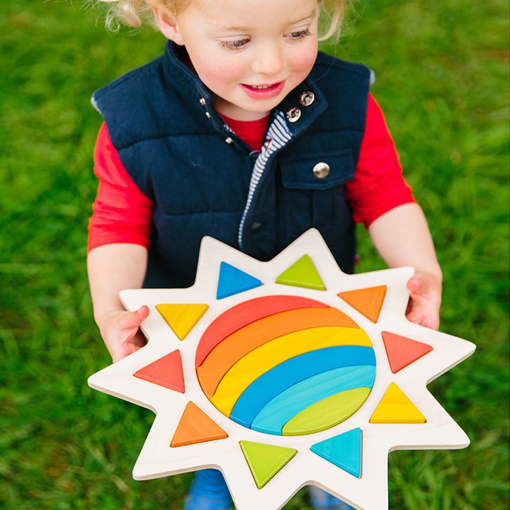Rainbow in the Sun, The Rainbow in the Sun is made of sturdy wooden material which ensures durability and long-lasting playtime for little ones. The vibrant colours and adorable sun shape make this puzzle a fun addition to playtime while still providing educational benefits. Not only will your child have fun matching colours and shapes, but they'll also be developing critical thinking skills as they solve the puzzle. The Rainbow in the Sun puzzle's size is perfect for little hands to grasp and manipulate, e