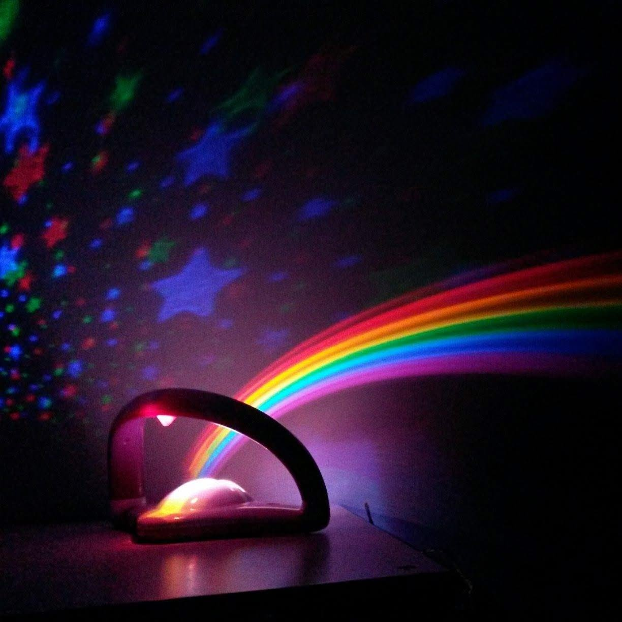 Rainbow projector light, rainbow projector light,rainbow light,rainbow light,rainbow in my room,rainbow light on my room,sensory light,sensory lighting,sensory rainbow light,eureka my very own rainbow, Rainbow projector light,Rainbow Projector Light – Bring the Magic of a Rainbow into Your Room! Transform your space into a dazzling wonderland with the enchanting Rainbow Projector Light. Using multi-coloured LEDs, this magical gadget projects a vibrant, lifelike rainbow that stretches across your walls and c