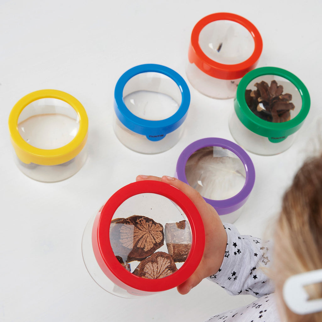 Rainbow Viewers Pack of 6, The Rainbow Viewers are a set of observation pots with a magnifier in the brightly coloured push on lids.The Rainbow Viewers are ideal for investigating natural resources up close. The Rainbow Viewers make it easy to view insects without harming and handling them. Can be used when children are investigating invertebrates up close in order to classify them into commonly found groups such as insects, spiders, snails and worms. In six different colours, each child can easily identify