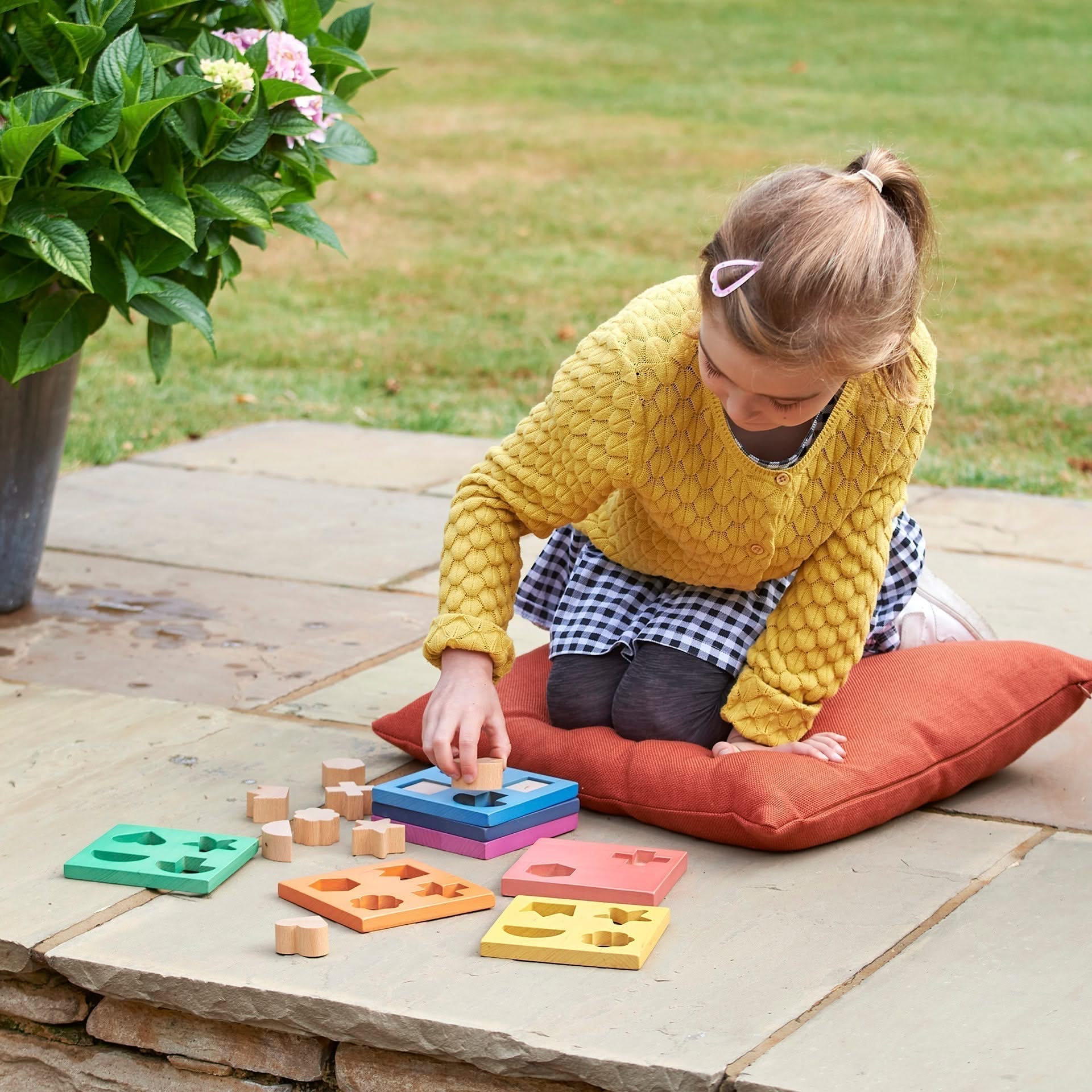 Rainbow Wooden Shape Stacker, Rainbow Wooden Shape Stacker,TickIT Rainbow Wooden Shape Stacker,Rainbow Wooden Shape Stacker, Rainbow Wooden Shape Stacker,Our TickiT® Rainbow Wooden Shape Stacker is a colourful and fun puzzle to help your child with shape recognition and problem solving skills. Made from beautiful smooth solid beechwood with a natural woodgrain finish in the 7 different colours of the rainbow. The 12 tactile shape cut outs nest inside a rounded squareOur TickiT® Rainbow Wooden Shape Stacker 