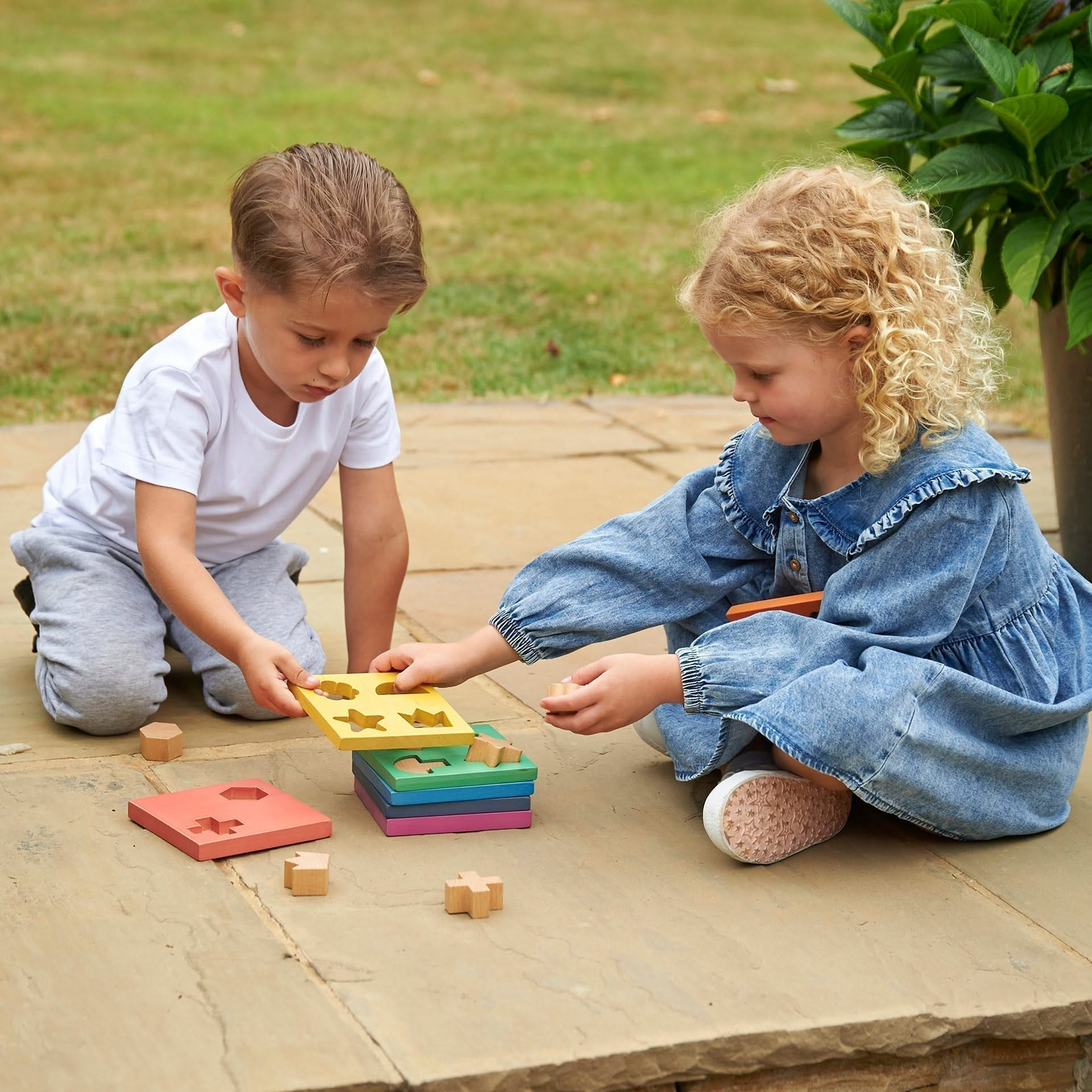 Rainbow Wooden Shape Stacker, Rainbow Wooden Shape Stacker,TickIT Rainbow Wooden Shape Stacker,Rainbow Wooden Shape Stacker, Rainbow Wooden Shape Stacker,Our TickiT® Rainbow Wooden Shape Stacker is a colourful and fun puzzle to help your child with shape recognition and problem solving skills. Made from beautiful smooth solid beechwood with a natural woodgrain finish in the 7 different colours of the rainbow. The 12 tactile shape cut outs nest inside a rounded squareOur TickiT® Rainbow Wooden Shape Stacker 