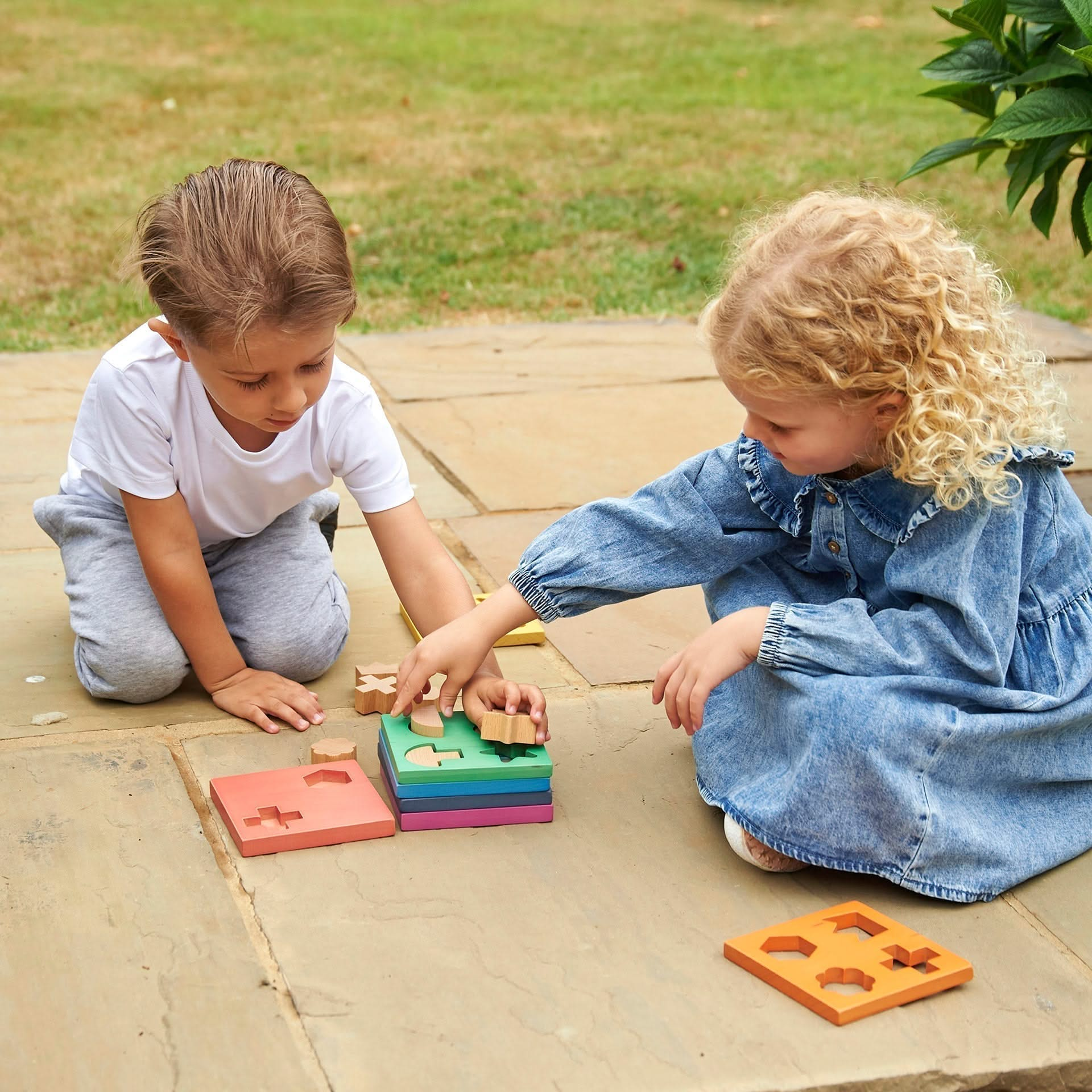 Rainbow Wooden Shape Stacker, Rainbow Wooden Shape Stacker,TickIT Rainbow Wooden Shape Stacker,Rainbow Wooden Shape Stacker, Rainbow Wooden Shape Stacker,Our TickiT® Rainbow Wooden Shape Stacker is a colourful and fun puzzle to help your child with shape recognition and problem solving skills. Made from beautiful smooth solid beechwood with a natural woodgrain finish in the 7 different colours of the rainbow. The 12 tactile shape cut outs nest inside a rounded squareOur TickiT® Rainbow Wooden Shape Stacker 