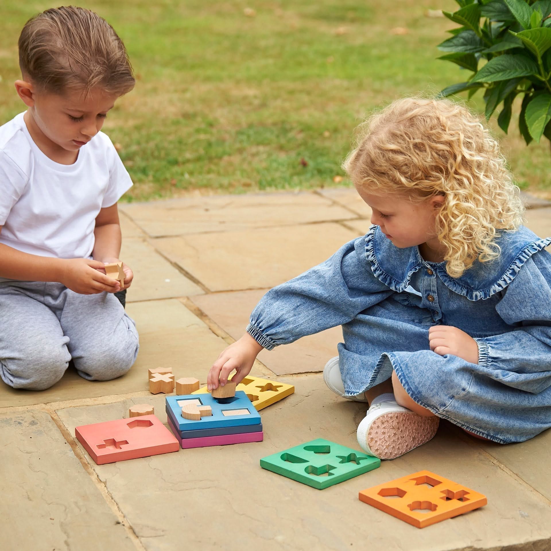 Rainbow Wooden Shape Stacker, Rainbow Wooden Shape Stacker,TickIT Rainbow Wooden Shape Stacker,Rainbow Wooden Shape Stacker, Rainbow Wooden Shape Stacker,Our TickiT® Rainbow Wooden Shape Stacker is a colourful and fun puzzle to help your child with shape recognition and problem solving skills. Made from beautiful smooth solid beechwood with a natural woodgrain finish in the 7 different colours of the rainbow. The 12 tactile shape cut outs nest inside a rounded squareOur TickiT® Rainbow Wooden Shape Stacker 